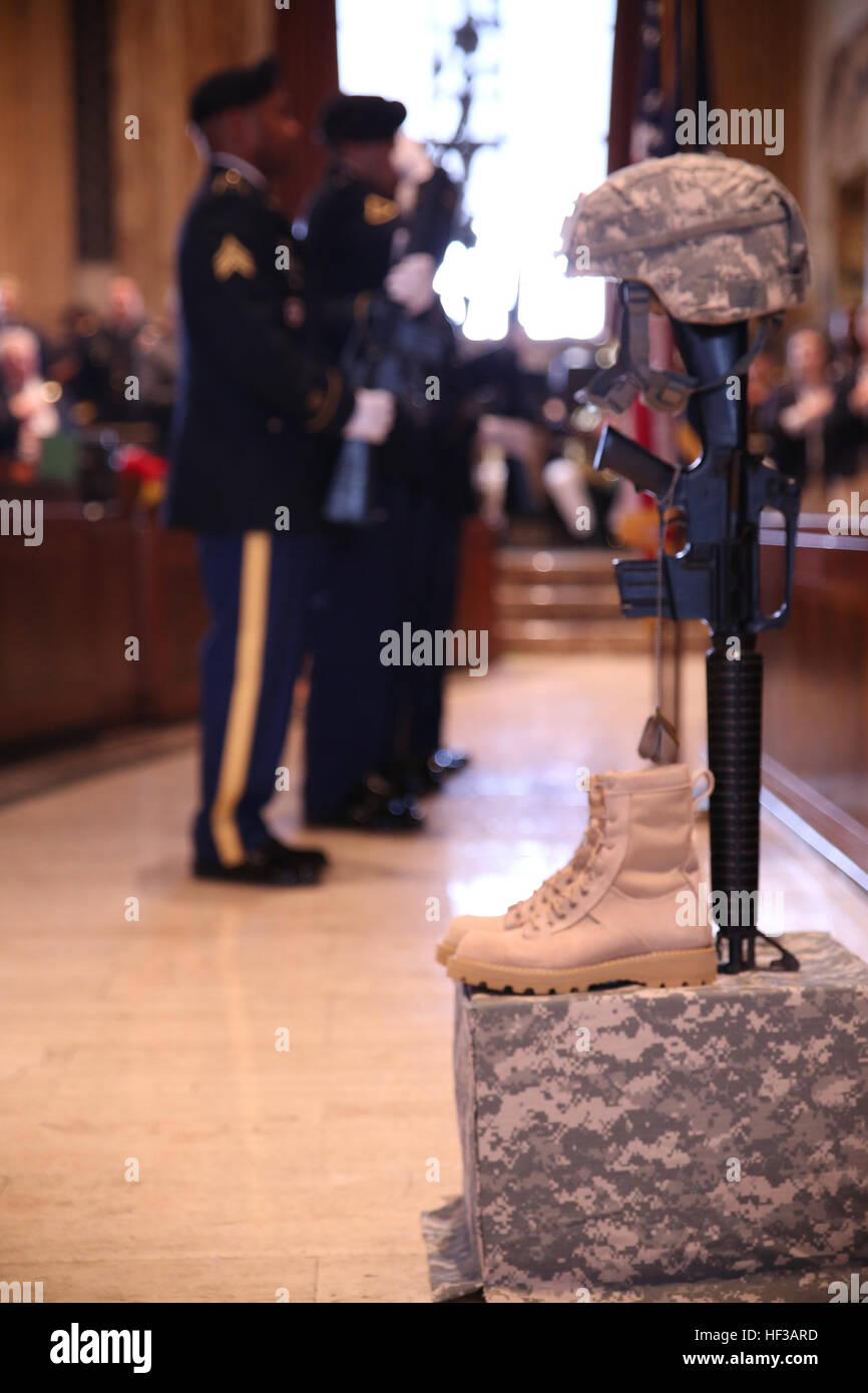 Members of the 321st Sustainment Brigade Color Guard, U.S. Army Reserves, present the American flag during a Memorial Day ceremony on the floor of the Louisiana House of Representatives at the state capital in Baton Rouge, Louisiana, May 21, 2015. The House held a ceremony with Lt. Gen. Richard P. Mills, commander of Marine Forces Reserve and other senior leaders from service branches in the local area to commemorate those who lost their lives in battle for the country. A day of remembrance, Where all gave some, some gave all. 150521-M-OL895-018 Stock Photo