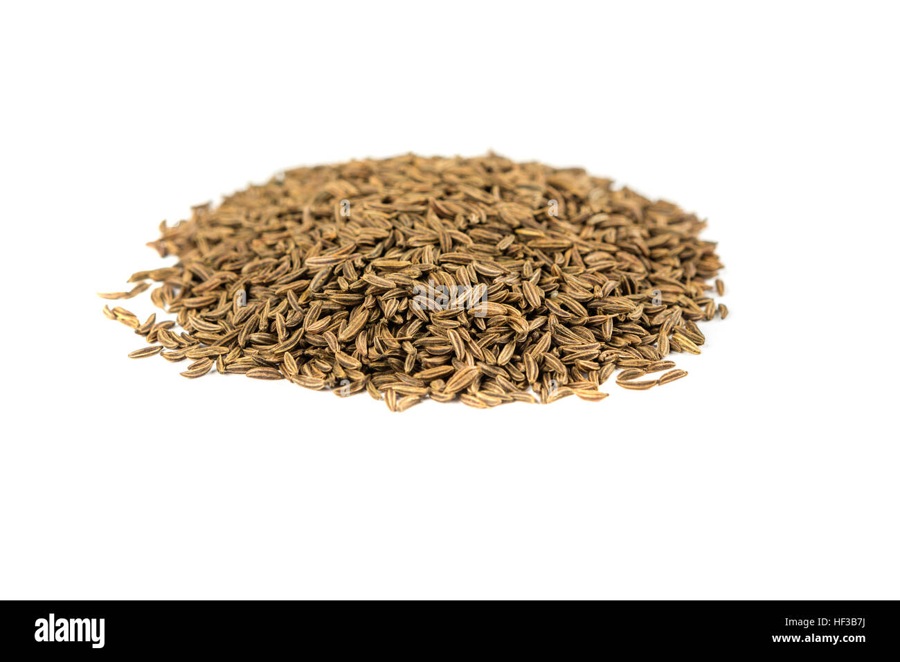 Whole caraway seed isolated on white background Stock Photo - Alamy