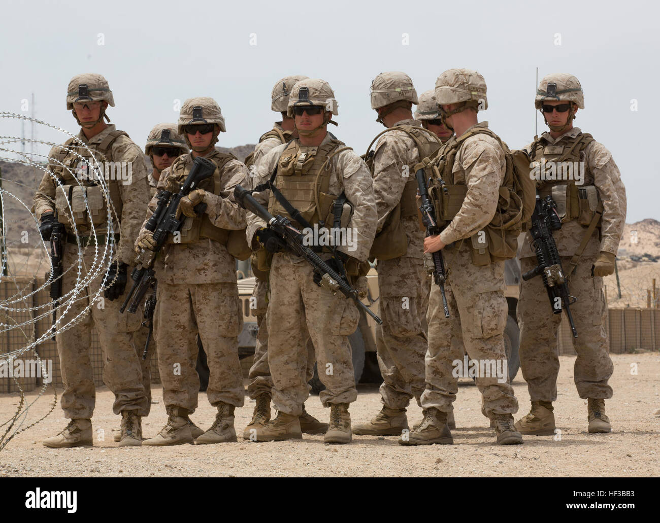 U.S. Marines with Kilo Company, 3rd Battalion, 8th Marines (3/8), conduct an embassy reinforcement during Integrated Training Exercise (ITX) 3-15 aboard Marine Corps Air Ground Combat Center Twentynine Palms, Calif., May 26, 2015. 6th Marines and subordinate units participated in ITX 3-15 to ensure all elements of Special-Purpose Marine Air Ground Task Force 6 (SPMAGTF-6) are prepared for upcoming deployments and operational commitments. (U.S. Marine Corps photo by Staff Sgt. Keonaona C. Paulo 2D MARDIV Combat Camera/Released) ITX 3-15 150526-M-EF955-426 Stock Photo