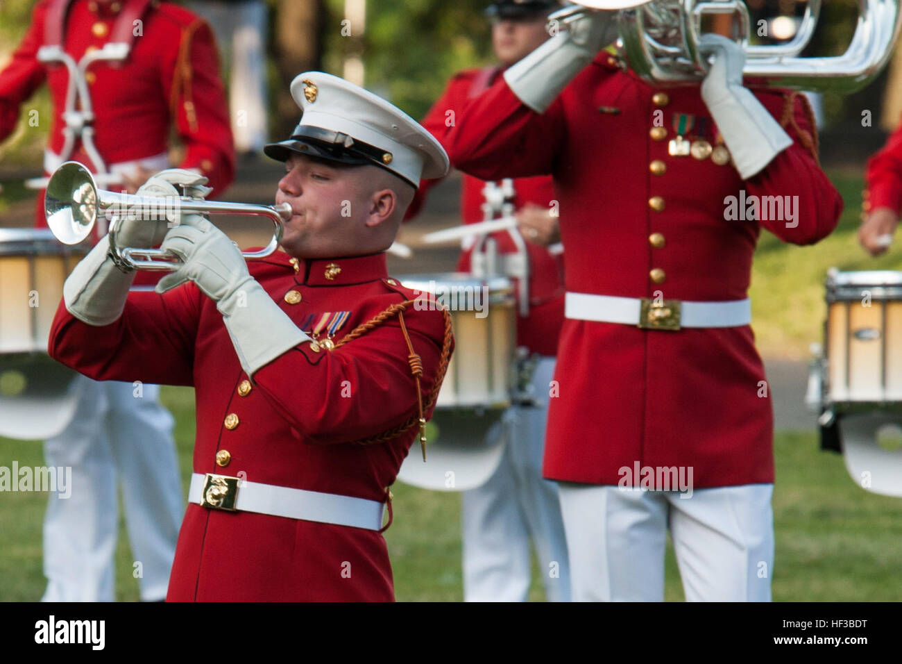 U.S. Marines of the Drum and Bugle Corps perform a sunset parade at the ...