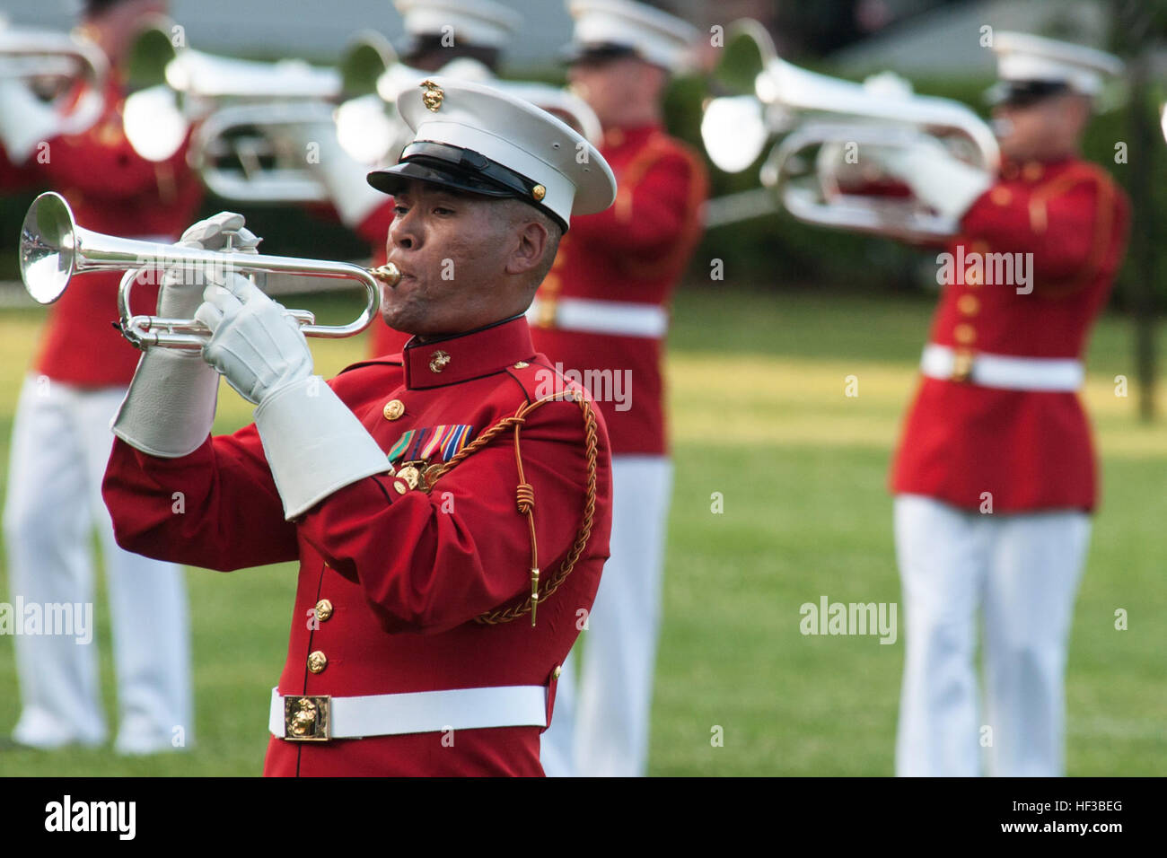 U.S. Marines with the U.S. Marine Corps Drum and Bugle Corps perform