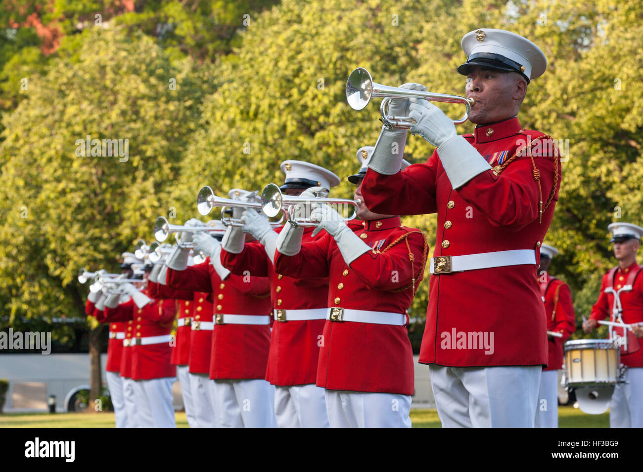 U.S. Marines with the U.S. Marine Corps Drum and Bugle Corps perform