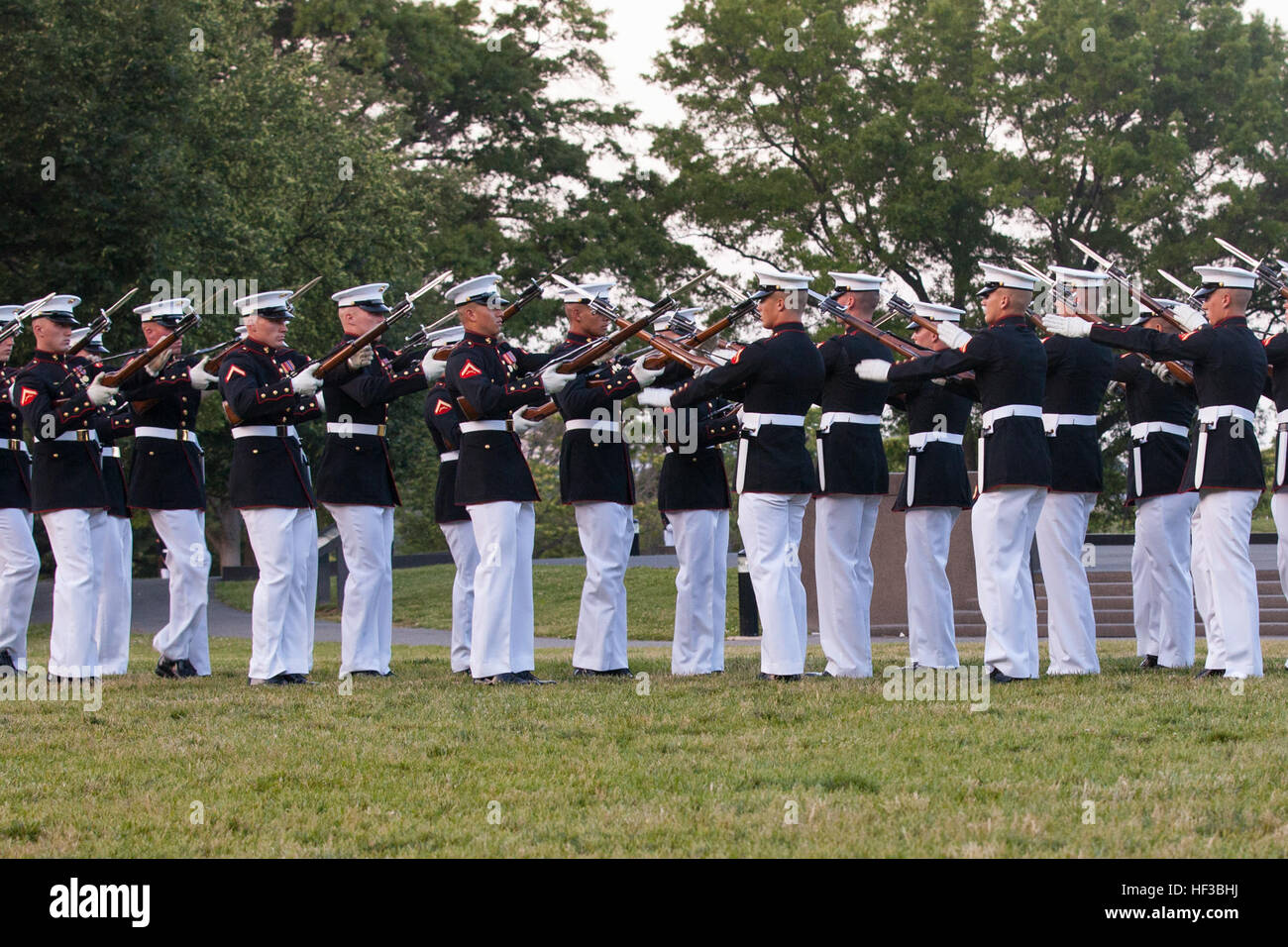 The U.S. Marine Corps Silent Drill Platoon performs during the sunset ...