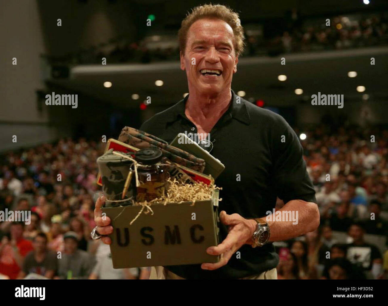 Arnold Schwarzenegger visited the Camp Pendleton Base Theater during a screening of the movie Terminator Genisys, June 14. Schwarzenegger, former Mr. Olympia and Governor of California, is an Austrian-born, Golden Globe and Emmy Award winning actor who has starred in more than 50 movies such as 'The Terminator,' 'Conan the Barbarian' and 'The Expendables.' 2002197 Arnold Schwarzenegger visited the Camp Pendleton Base Theater 2015 Stock Photo