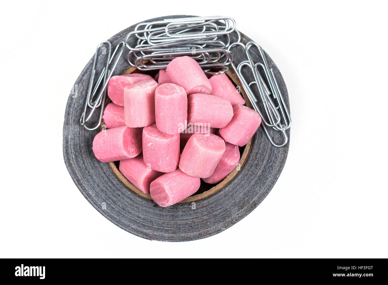 Concept, Held together by tape, bubblegum, and paper clips isolated on  white background Stock Photo - Alamy