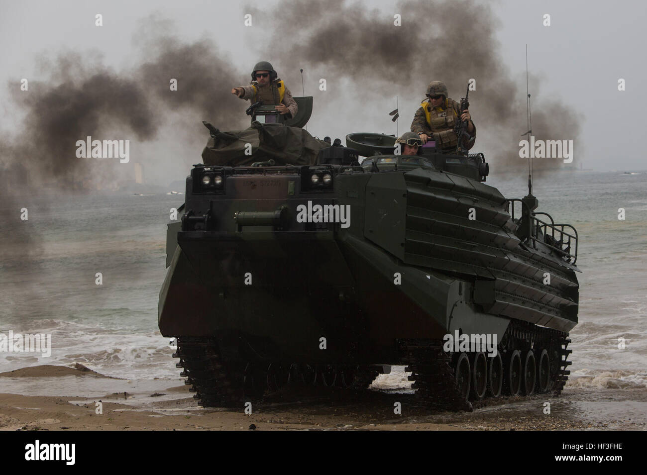 Marines with 4th Assault Amphibian Battalion drive an amphibious assault vehicle during a simulated amphibious assault at Peninsula Express 15-8 on Dogu Beach, July 3, 2015. Peninsula Express is the eighth iteration this year of the Korean Marine Exchange Program, and the first time Marine Forces Reserve has participated in the series of exercises between the U.S. and Republic of Korea Marine Corps designed to build interoperability and tactical familiarity between partner nations. U.S., ROK Marines share valuable training at Peninsula Express 15 150703-M-KN381-540 Stock Photo