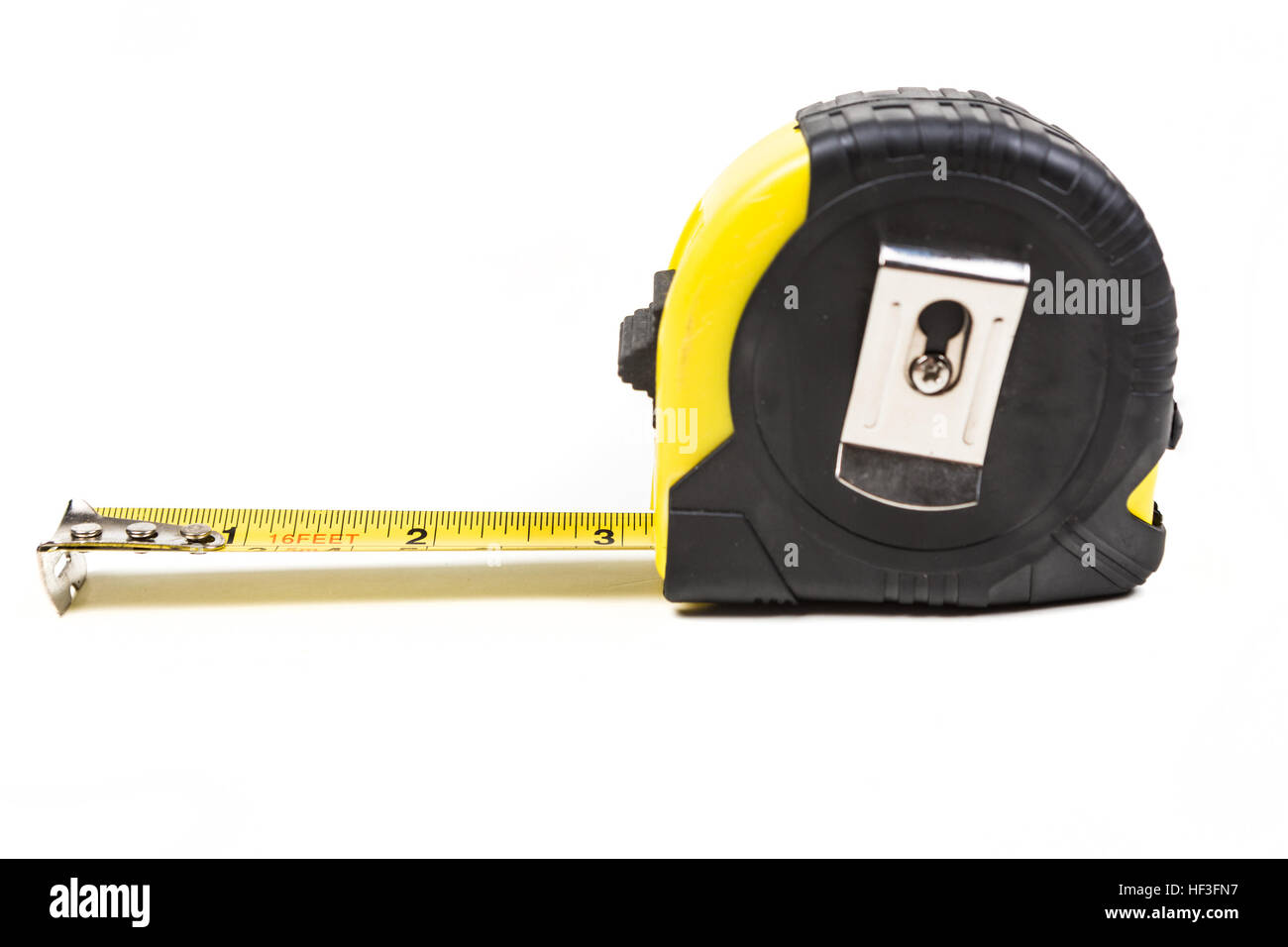 Yellow flexible tape measure Stock Photo - Alamy