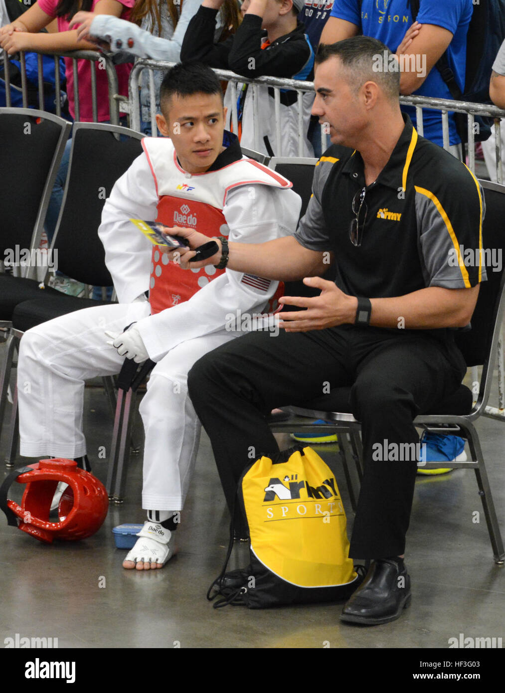 AllArmy Taekwondo Team head coach Staff Sgt. Jonathan Fennell (right
