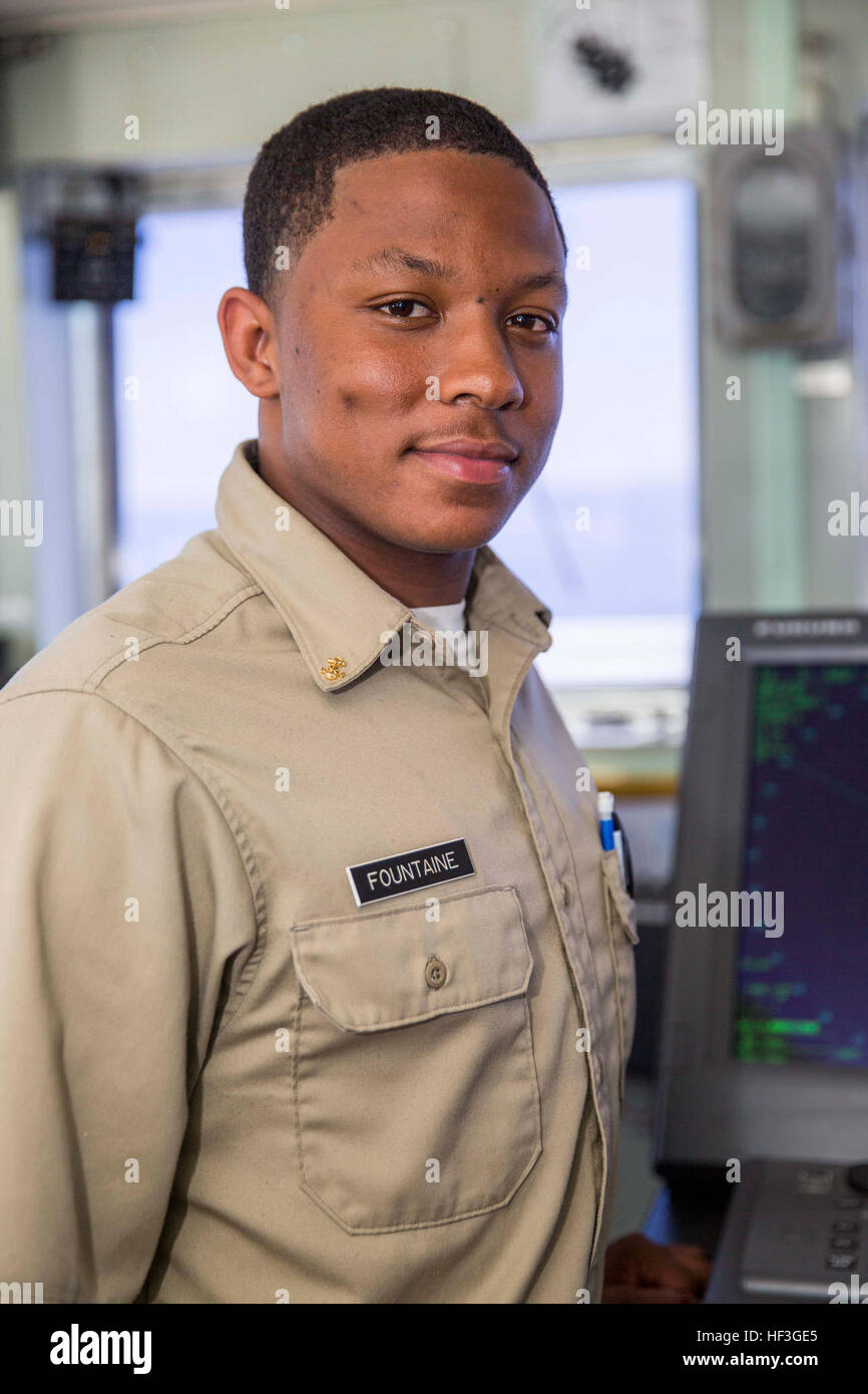 150713-M-DN141-055  BISMARCK SEA (July 13, 2015) Merchant Marine Cadet Markus Fountaine, from Tracy, Calif., poses for a photo on the pilothouse of the hospital ship USNS Mercy (T-AH 19). Mercy is en route to the Republic of the Philippines for Pacific Partnership 2015. Pacific Partnership is in its 10th iteration and is the largest annual multilateral humanitarian assistance and disaster relief preparedness mission conducted in the Indo-Asia-Pacific region. While training for crisis conditions, Pacific Partnership missions to date have provided real world medical care to approximately 270,000 Stock Photo