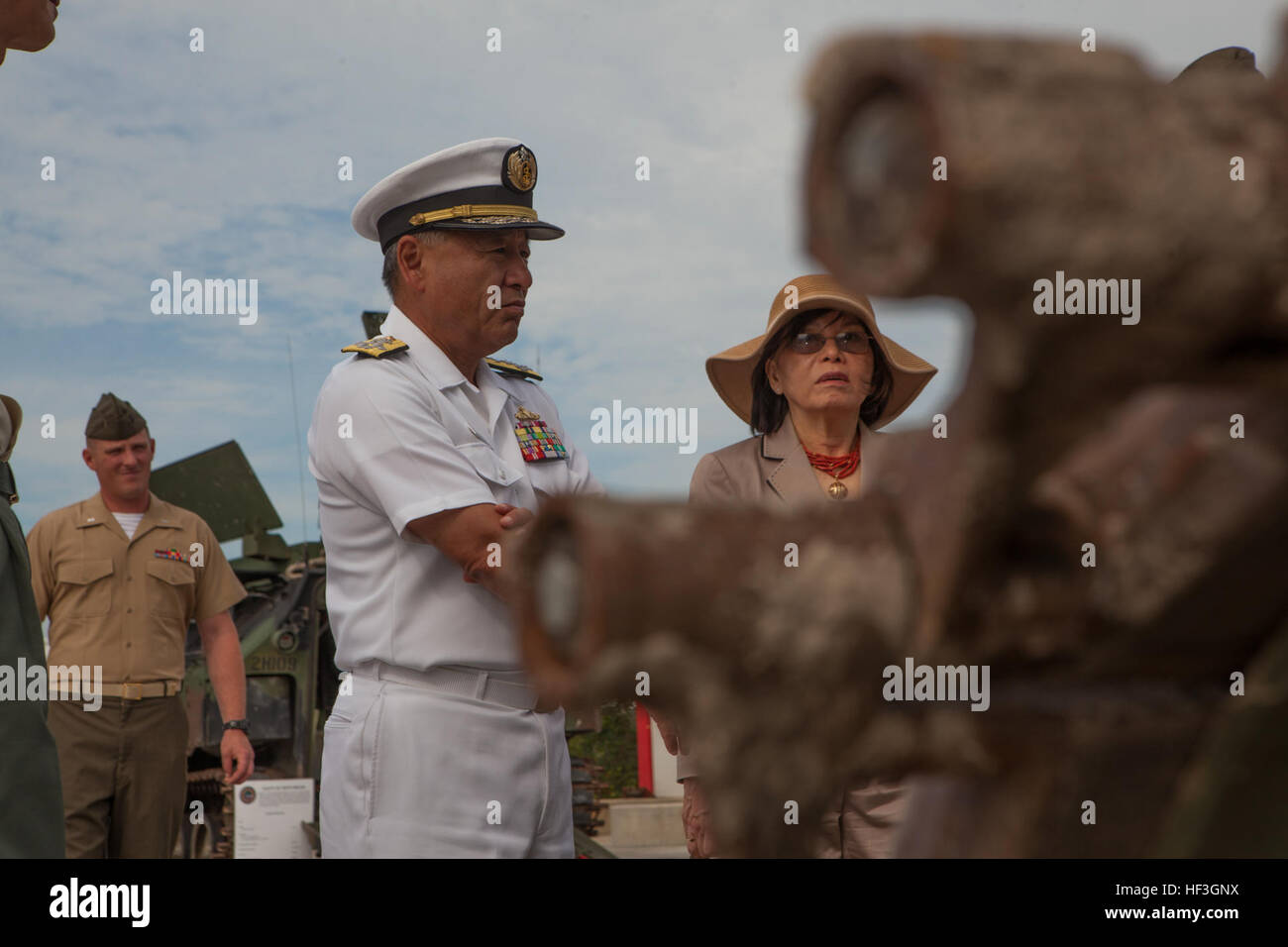 Japan's Admiral Katsutoshi Kawano, Chief of Staff, observes an Amphibious Assault Vehicle on Camp Lejeune, N.C., July 15, 2015. The purpose of the visit was to demonstrate Department of Defense support for Japan's efforts to upgrade capabilities of the Japan Self-Defense Forces to rapidly deploy air and amphibious capabilities and employ joint doctrine. (U.S. Marine Corps photo by Lance Cpl. Sarah Blendowski, 2d Marine Division, Combat Camera/Released) Japanese Chief of Staff Visit 150715-M-CH063-052 Stock Photo