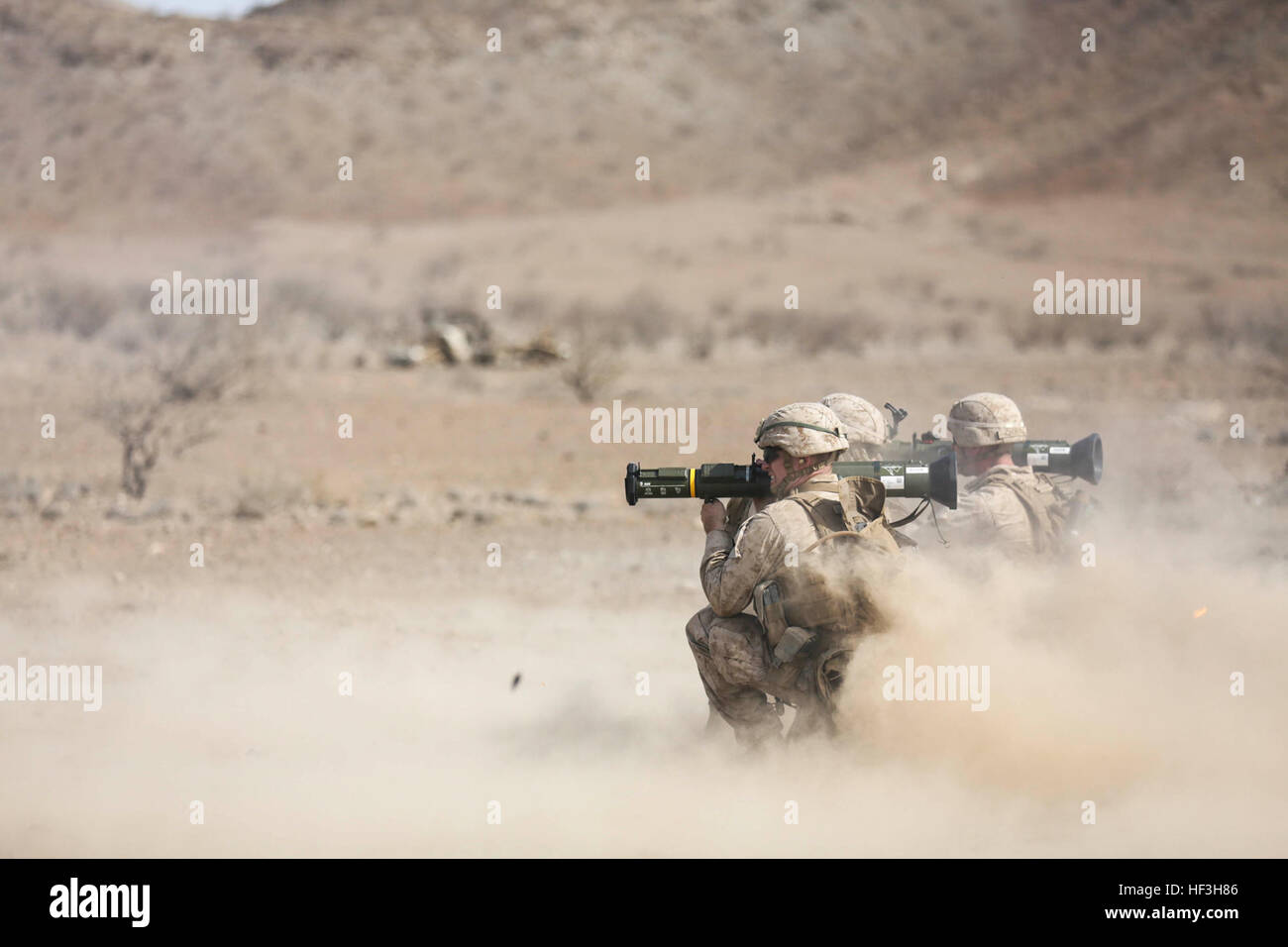Djibouti (July 22, 2015) U.S. Marines with Battalion Landing Team 3rd Battalion, 1st Marine Regiment, 15th Marine Expeditionary Unit fire AT-4 rockes during a rocket training exercise.  The Marines of BLT 3/1 conduct a series of attack and maneuver drills in Djibouti consisting of frag, machine gun, squad and night drills. The 15th MEU is embarked on the Essex Amphibious Ready Group and deployed to maintain regional security in the U.S. 5th Fleet area of operations. (U.S. Marine Corps photo by Sgt. Jamean Berry/Not Released) Fire in the hole, U.S. Marines train with rockets in Djibouti 150723- Stock Photo