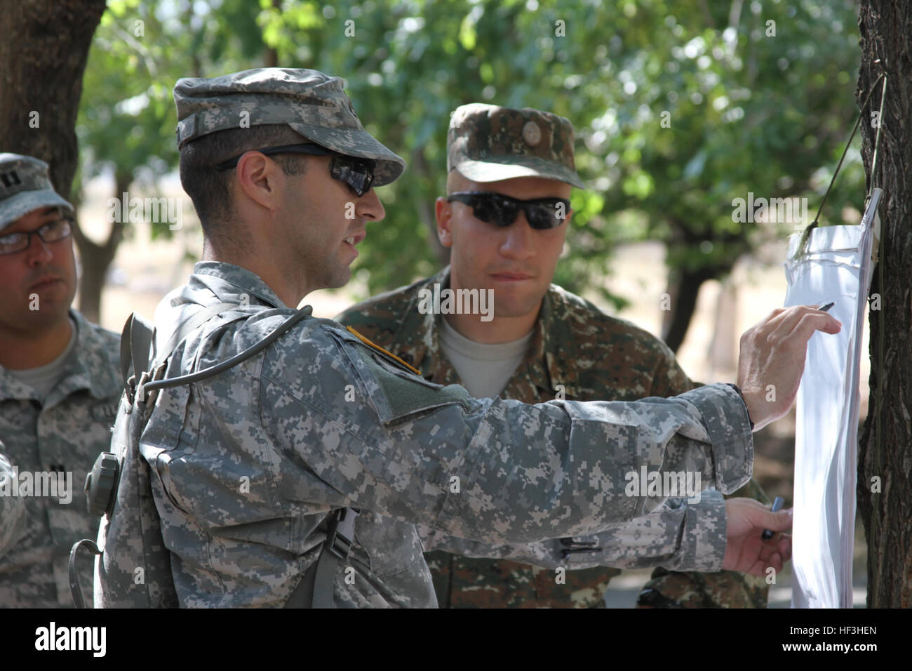 A small group of Kansas National Guardsmen assist and advise Soldiers with the Armenian Peacekeeping Brigade at the Zar Mountain Training Center, near Yerevan, Armenia, July 27 - Aug. 7, 2015, in preparation of a major NATO evaluation in September 2015. The combat readiness evaluation will be the culmination of a years-long process that would certify the interoperability of the Armenian PKB in support of NATO peacekeeping operations. Kansas and Armenia have been partnered in the National Guard Bureau's State Partnership Program since 2003. (U.S. Army National Guard photo by Sgt. Zach Sheely/Re Stock Photo