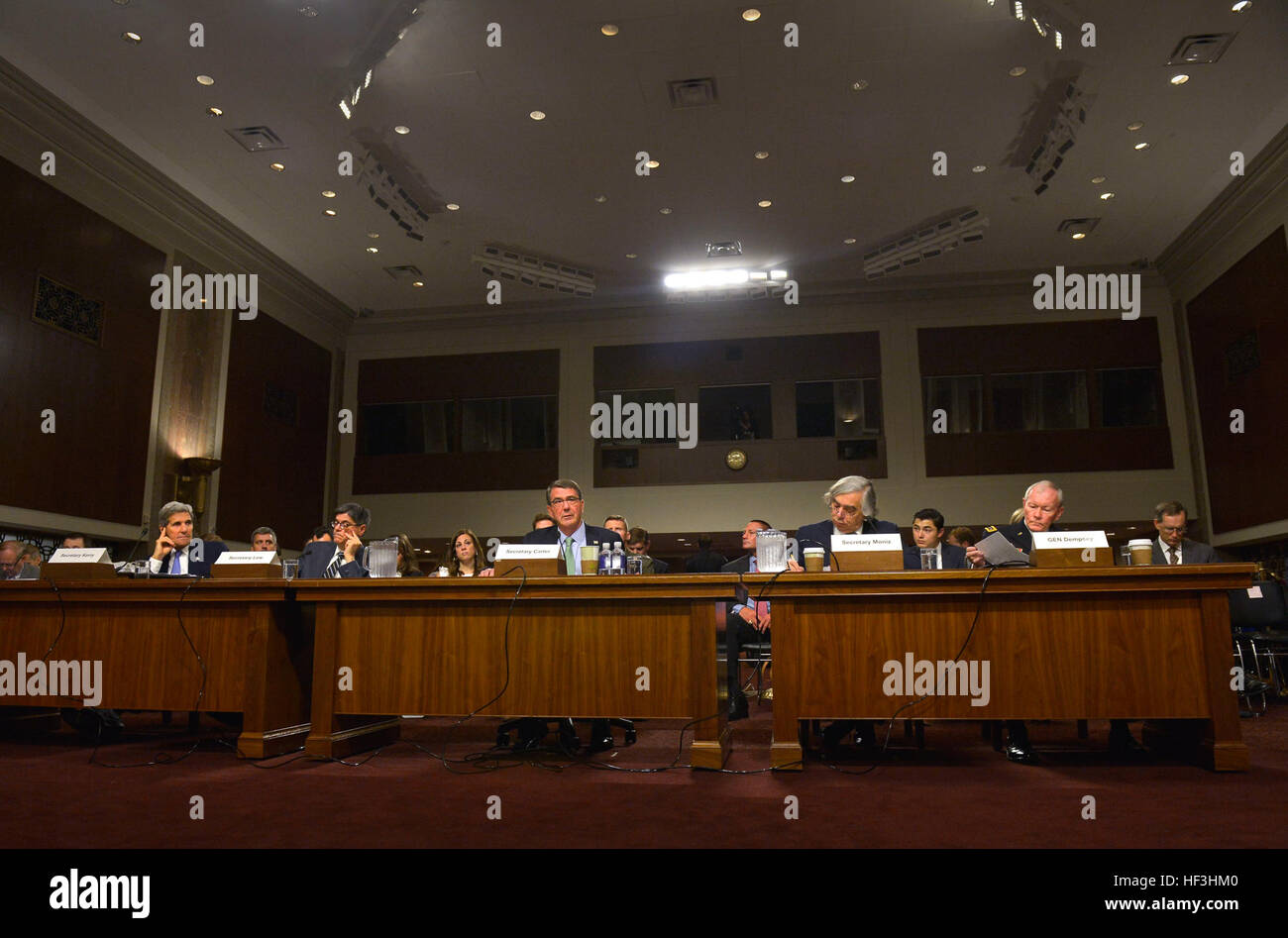 Secretary of Defense Ash Carter,center, testifies before the Senate Armed Services Committee on behalf of the Iranian nuclear deal recently brokered by the Obama administration in Washington, July 29, 2015. Carter was joined by Secretary of State John Kerry, from left, U.S. Treasury Secretary Jack Lew, Energy Secretary Ernest Moniz and Chairman of the Joint Chiefs of Staff Gen. Martin Dempsey. (DoD Photo by Glenn Fawcett /Released) Secretary of Defense Ash Carter testifies before the Senate Armed Services Committee 150729-D-NI589-293 Stock Photo