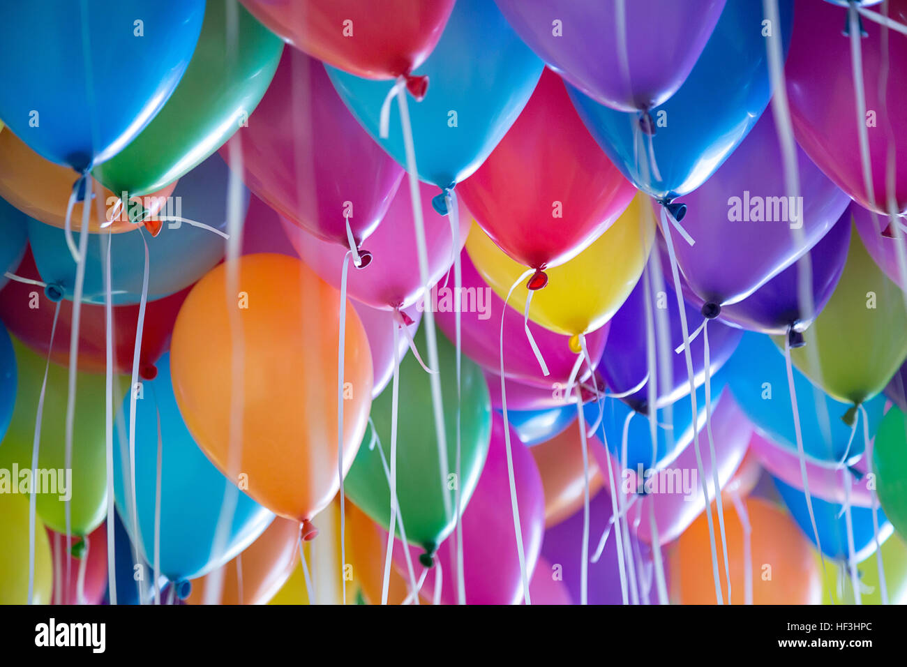 Balloons with helium hi-res stock photography and images - Alamy