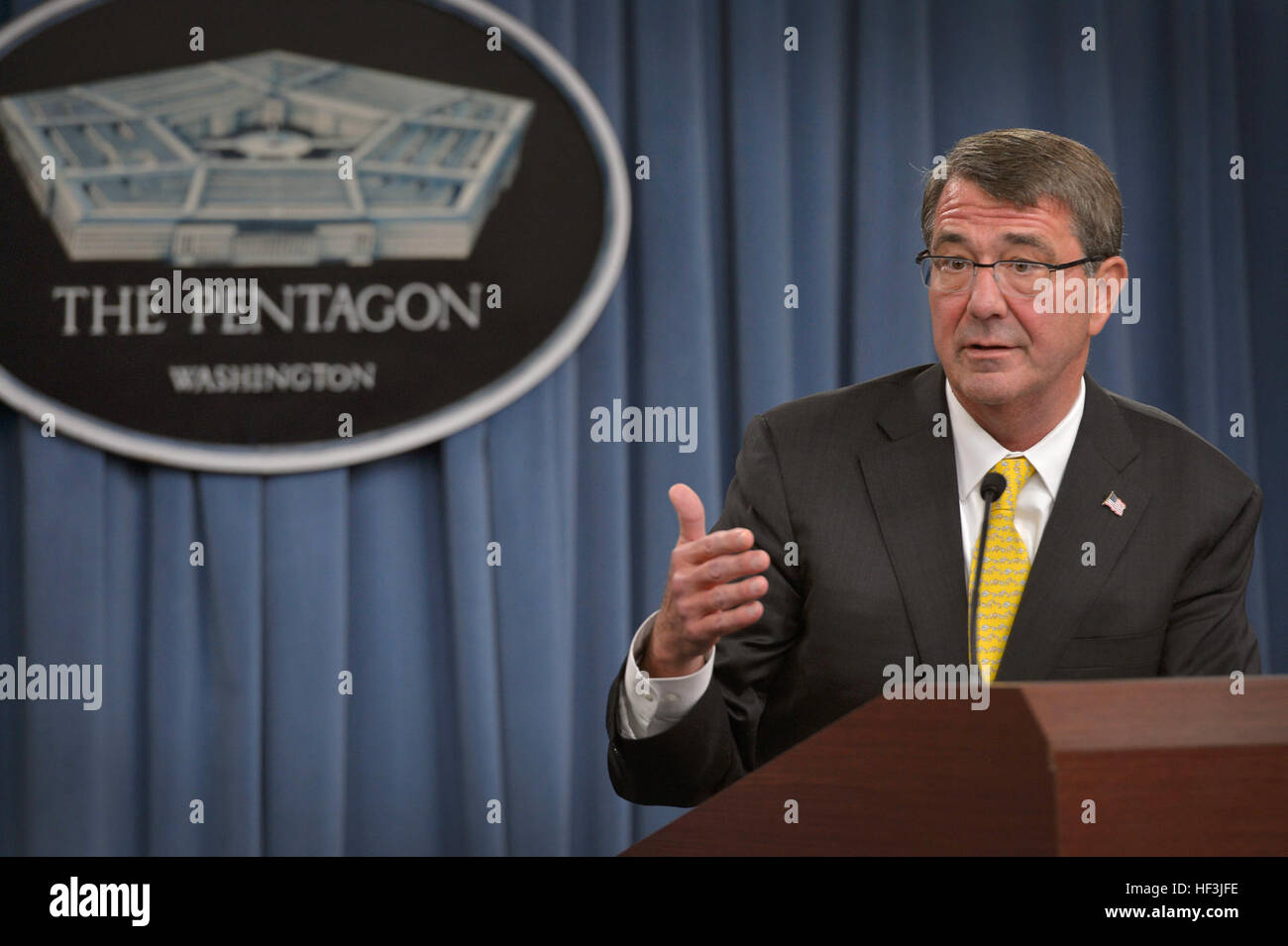 Secretary of Defense Ash Carter conducts a press briefing at the Pentagon Aug. 20, 2015. Carter answered questions from the media on a variety of issues including regional threats across the globe and potential logjams in Congress over the budget this fall. Carter also pointed out the recent graduation of the first two female soldiers of Army Ranger School, a significant milestone in DoD's plan to test the integration of women in combatant roles. (DoD Photo by Glenn Fawcett/Released) Defense secretary congratulates first female graduates of US Army Ranger School 150820-D-NI589-293 Stock Photo