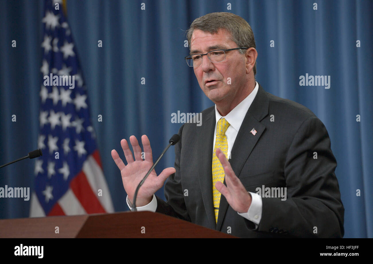 Secretary of Defense Ash Carter conducts a press briefing at the Pentagon Aug. 20, 2015. Carter answered questions from the media on a variety of issues including regional threats across the globe and potential logjams in Congress over the budget this fall. Carter also pointed out the recent graduation of the first two female soldiers of Army Ranger School, a significant milestone in DoD's plan to test the integration of women in combatant roles. (DoD Photo by Glenn Fawcett/Released) Defense secretary congratulates first female graduates of US Army Ranger School 150820-D-NI589-359 Stock Photo