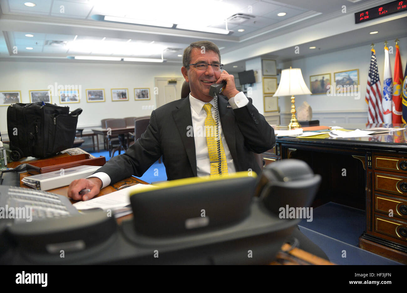 Secretary of Defense Ash Carter speaks by phone with Army 1st Lt. Shaye Haver and 1st Lt. Kristen Griest to congratulate the two for their recent graduation from the rigorous Army Ranger School from his office at the Pentagon, Aug. 20, 2015. Haver and Griest are the first women to successfully complete the course after the Army began allowing women to participate in the elite program. (DOD Photo by Glenn Fawcett/Released) Secretary of defense congratulates first women to graduate from US Army Ranger School 150820-D-NI589-054 Stock Photo