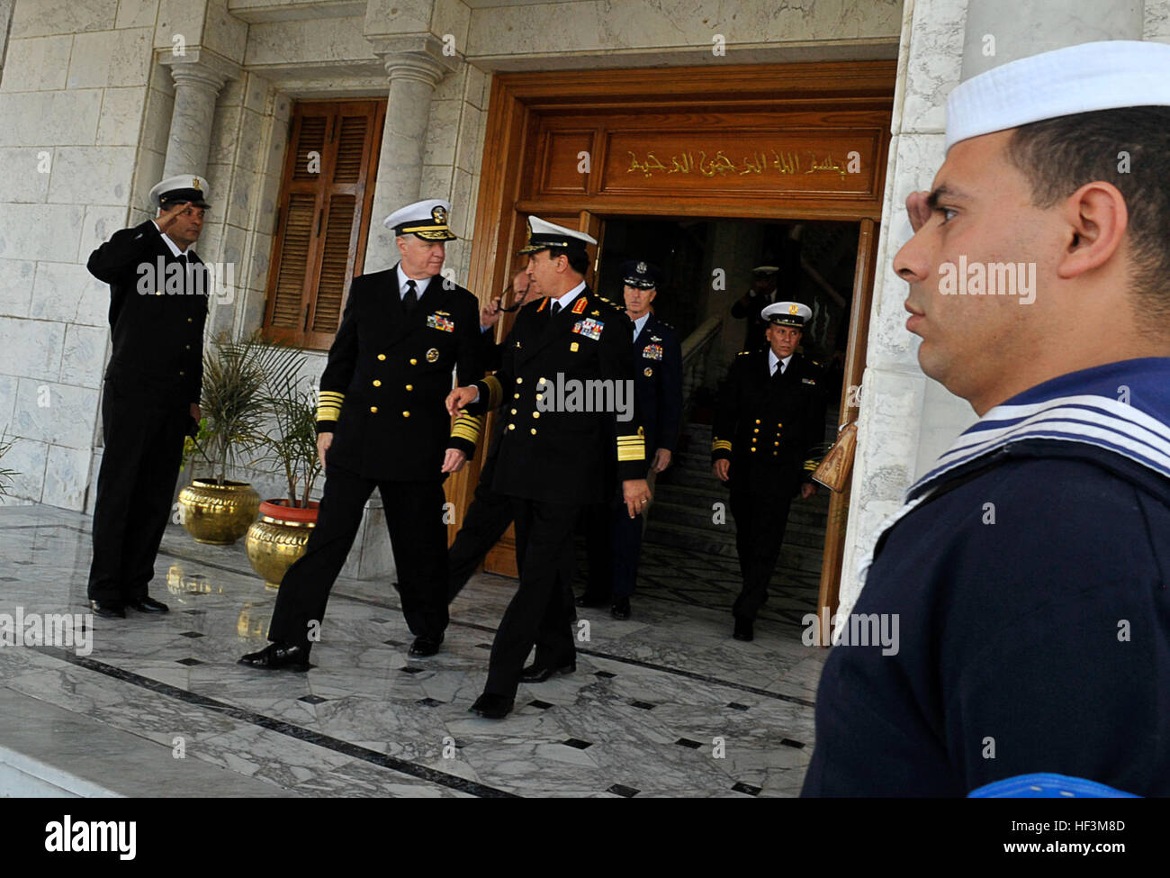 Chief of Naval Operations  Adm. Gary Roughead, middle, departs Egyptian Naval Headquarters with his counterpart, Commander-in-Chief of Egyptian Naval Forces Vice Adm. Mohab Mameesh, and other senior Egyptian leadership during a visit to Alexandria Naval Base. Chief of Naval Operations DVIDS222904 Stock Photo