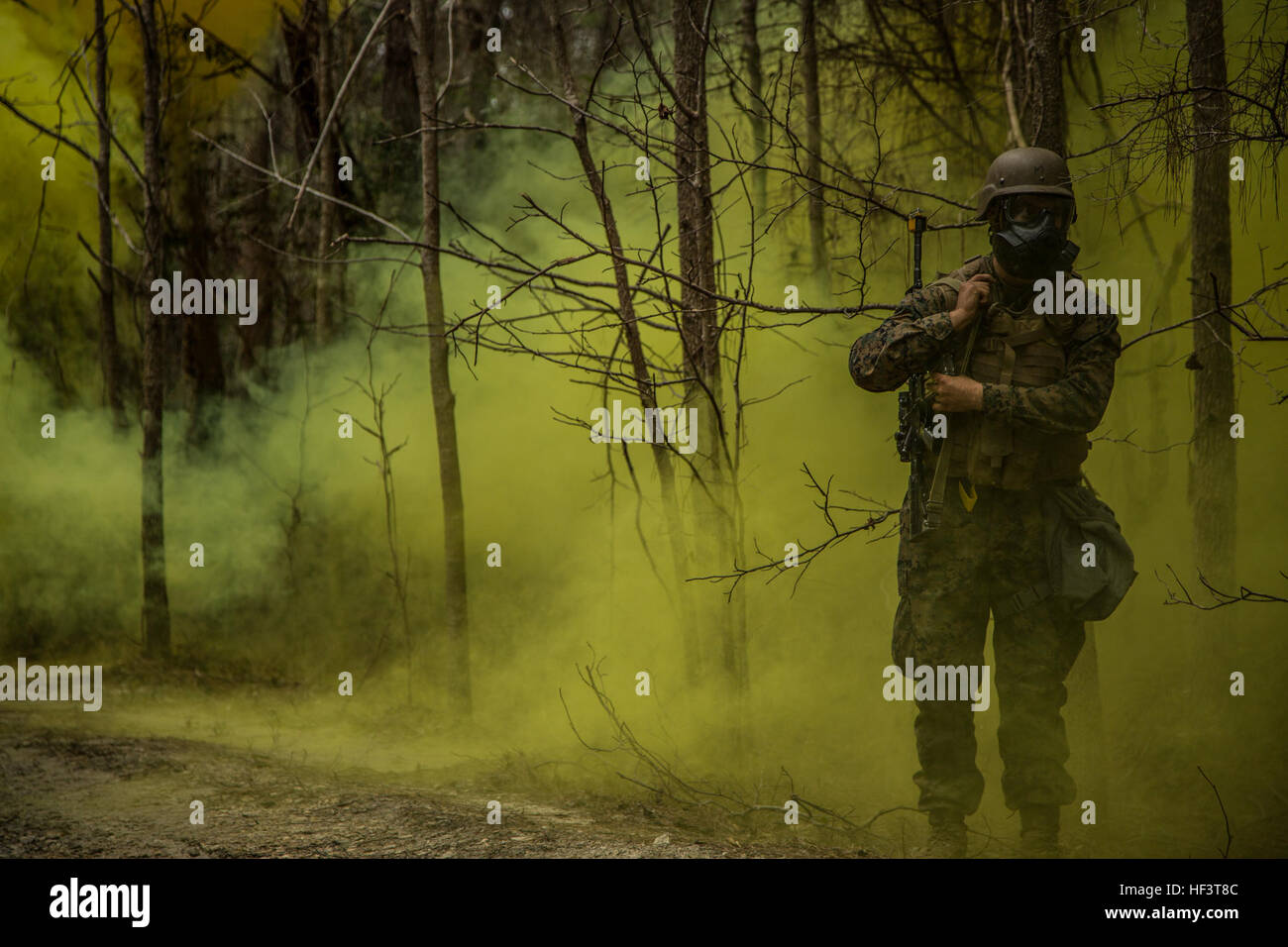 A U.S. Navy Corpsman assigned to Field Medical Training Battalion East (FMTB-E), slings his M4 Carbine rifle during a final exercise (FINEX) at Camp Johnson, N.C., March 1, 2016. FINEX is a culminating event at FMTB-E which transitions Sailors into the Fleet Marine Force. (U.S. Marine Corps photo by Sgt. James R. Skelton/Released) FMTB-E FINEX 160301-M-UY829-148 Stock Photo