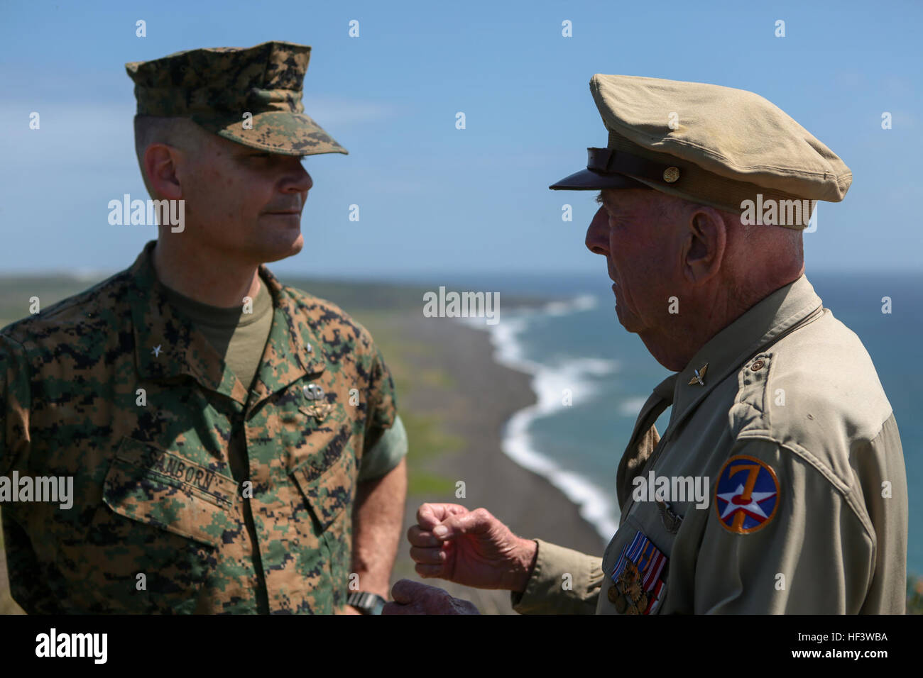 Army Air Corps Capt. Jerry Yellin, right, speaks to Brig. Gen. Russell A. Sanborn commanding general, 1st Marine Aircraft Wing on top of Mount Suribachi at Iwo To, Japan, March 19, 2016. The Iwo Jima Reunion of Honor is an opportunity for Japanese and U.S. veterans and their families, dignitaries, leaders and service members from both nations to honor the battle while recognizing 71 years of peace and prosperity in the U.S. – Japanese alliance. (U.S. Marine Corps photo by MCIPAC Combat Camera Lance Cpl. Juan Esqueda / Released) Iwo Jima 71st Reunion of Honor 160319-M-JD520-071 Stock Photo