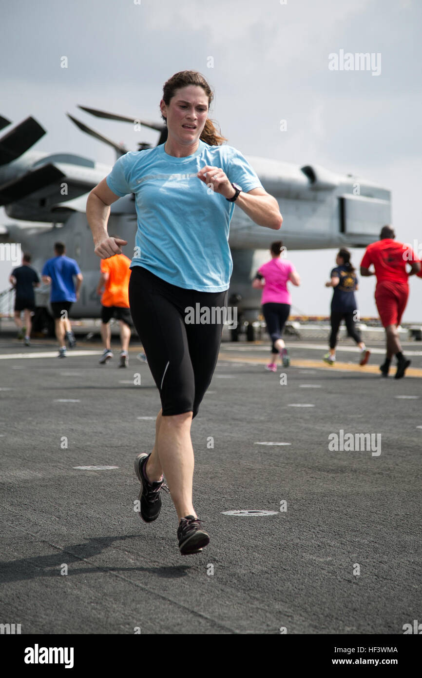 At sea. (March 27, 2016)-U.S. Marine Maj. Michelle Melendez, 13th Marine Expeditionary Unit, participates in a 5k run for women's history month, March 27, 2016, during the MEU's western pacific deployment aboard the USS Boxer. More then 4,500 Marines and Sailors from the Boxer ARG, 13th MEU team are currently transiting the Pacific Ocean toward the U.S. 5th fleet area of operations during a scheduled deployment. (U.S. Marine Corps photo by Sgt. Briauna Birl/RELEASED) Women's History 5k aboard USS Boxer 160327-M-KR317-188 Stock Photo