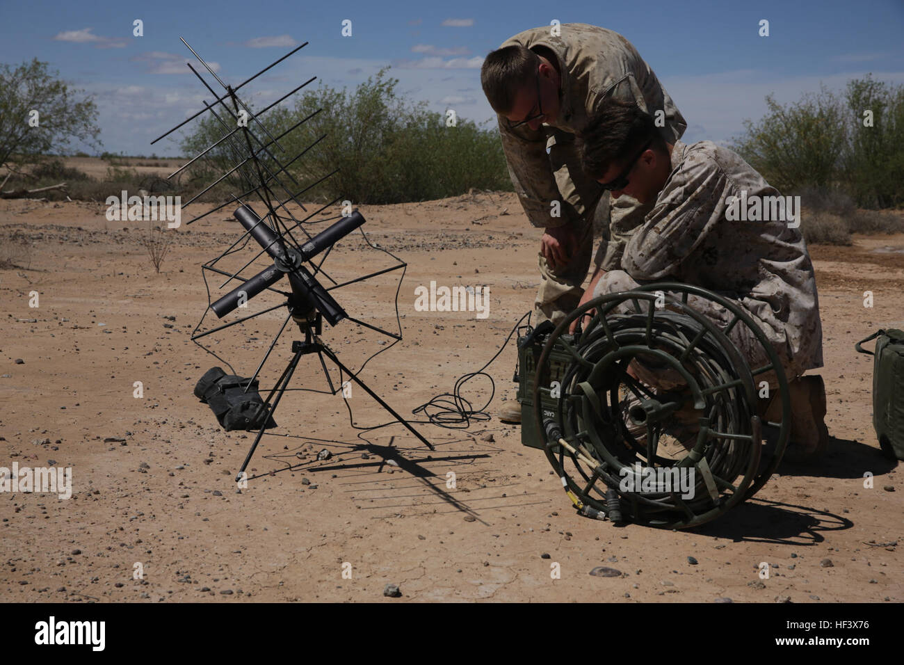 U.S. Marine Corps Cpl. Dustin A. Young, right, and Cpl. Nathan Shunk ...