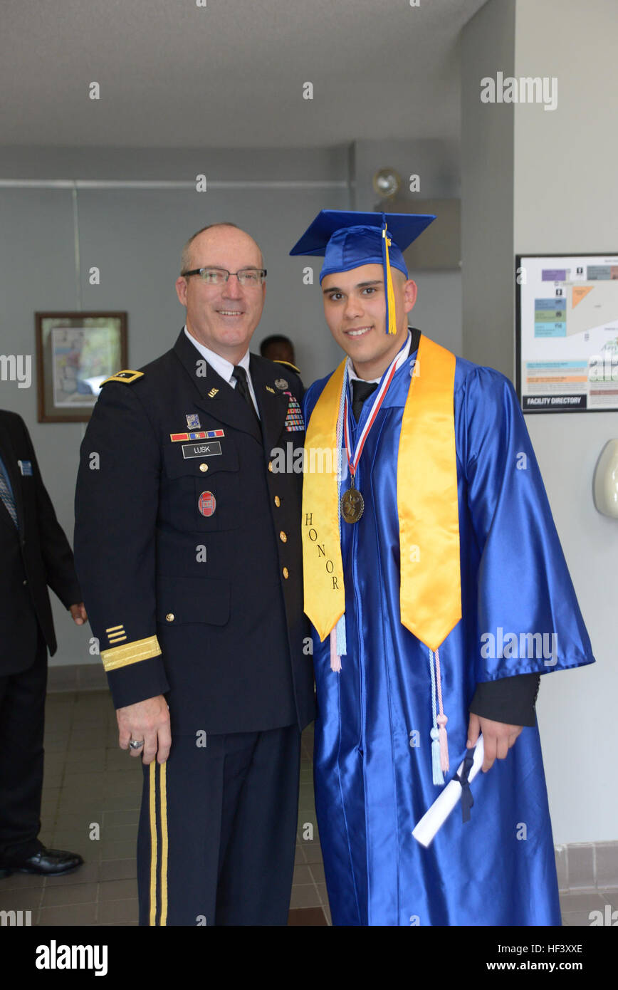 Maj. Gen. Greg Lusk, the adjutant general of North Carolina, stands with Honor Graduate Cadet Samuel Moran, after Class 01 of the New London’s Tarheel Challenge Academy graduates at the Stanly County Agri-Civic Center in Albemarle, North Carolina, April 21, 2016.  September 2015 marked the grand opening of the New London Tarheel Challenge Academy (TCA) program. The Tarheel Challenge Academy, sponsored by the North Carolina National Guard, has a sister location in Salemburg that has been in operation for over 21 years, and graduated over 4,300 youth. TCA is a unique quasi-military structure ins Stock Photo