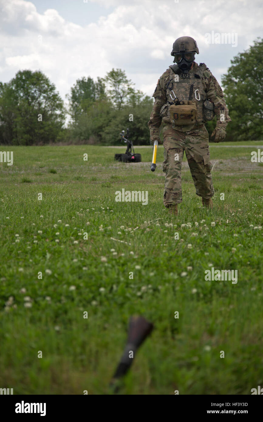 U.S. Army Staff Sgt. Kenneth Dollar, assigned to the 666th Ordnance Company (EOD), 441st Ordnance Battalion (EOD), Alabama National Guard, approaches simulated unexploded ordnance during a scenario for the 111th Ordnance Group (EOD) Team of the Year 2016 competition at the Wendell H. Ford Regional Training Center, Greenville, Ky., April 26, 2016. The weeklong competition tests teams in various scenarios they may encounter in situations around the world, to determine the most physically, mentally, tactically, and technically fit team to represent their command in future competition. (U.S. Army  Stock Photo