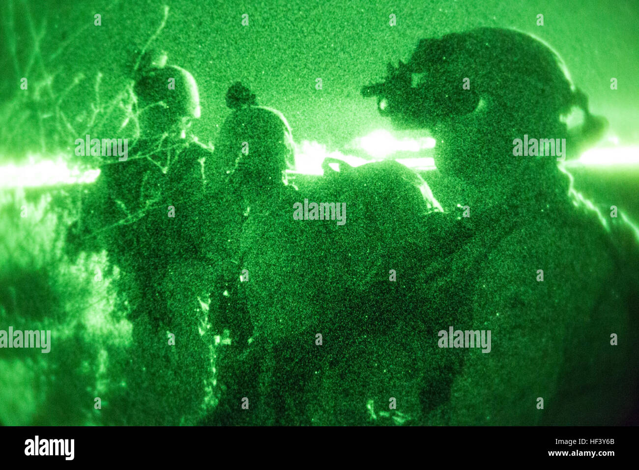 Marines set up a security perimeter after moving to a simulated enemy compound during a night raid training evolution aboard Marine Corps Base Camp Pendleton, Calif., April 28, 2016. The Battalion Landing Team trained throughout the night, improving their ability to effectively perform a raid on an enemy compound. The Marines are with the Light Armored Reconnaissance company of BLT 1st Bn., 4th Marines, 11th Marine Expeditionary Unit. Light Armored Reconnaissance Raid 160428-M-KJ317-121 Stock Photo