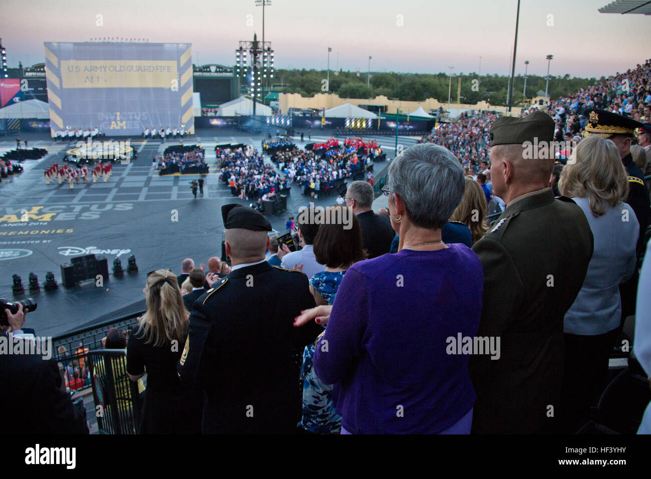 Commandant of the Marine Corps Gen. Robert B. Neller and his wife D'Arcy attend the opening ceremony of the Invictus Games at the ESPN Wide World of Sports Complex, Orlando, Fla., May 8, 2016. This year's games feature 500 wounded or injured service members from 14 nations competing in 10 adaptive sporting events. (U.S. Marine Corps photo by Staff Sgt. Gabriela Garcia/Released) CMC at the Invictus Games 160509-M-SA716-076 Stock Photo