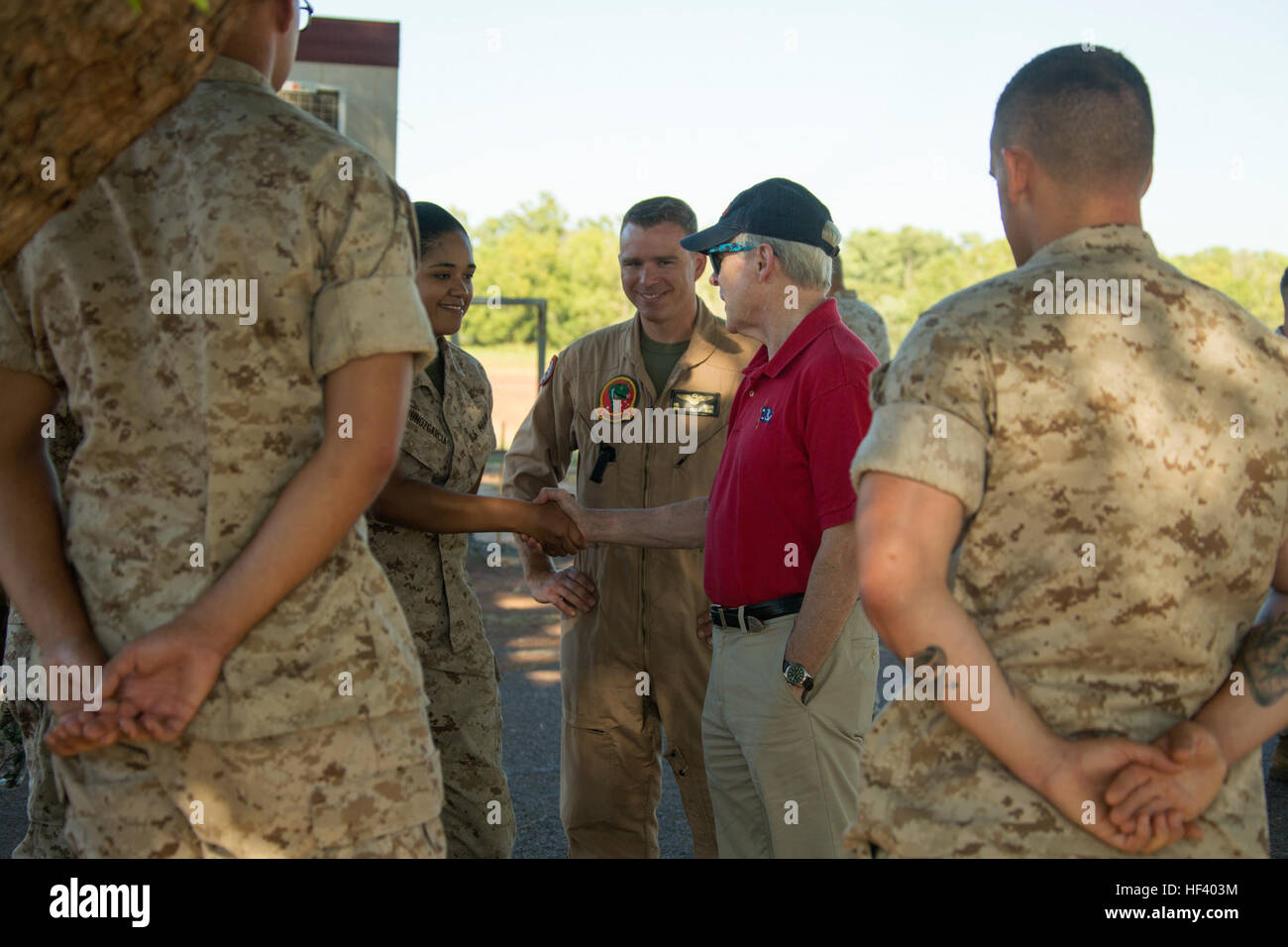Ray Mabus, Secretary of the Navy, greets Marines of Marine Rotational Force – Darwin’s Aviation Combat Element at Royal Australian Air Force Base Darwin, Northern Territory, Australia, May 14, 2016. Mabus came to Darwin to visit the Marines and Sailors of MRF-D and observe live-fire ranges.  (U.S. Marine Corps photo by Cpl. Carlos Cruz Jr./Released) MRF-D 2016, SECNAV visits Marines in the Top End 160514-M-KE800-049 Stock Photo