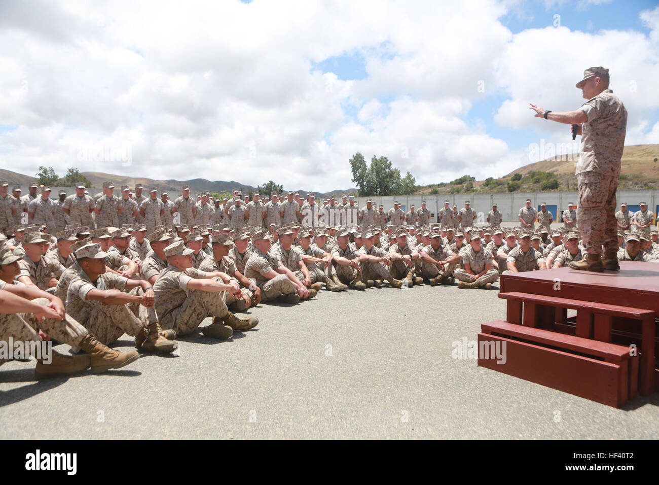 U.S. Marine Corps Gen. Robert Neller, Commandant of the Marine Corps, talks to Marines of 1st Maintenance Battalion, Combat Logistics Regiment 15, 1st Marine Logistics Group on Camp Pendleton, Calif., May 24, 2016. Gen. Neller addressed the future of the Marine Corps and answered questions from the Marines. (U.S. Marine Corps photo by Sgt. Rodion Zabolotniy, Combat Camera, Camp Pendleton/RELEASED) Commandant of the Marine Corps Printing the Future (Image 1 of 13) 160524-M-HT768-069 Stock Photo