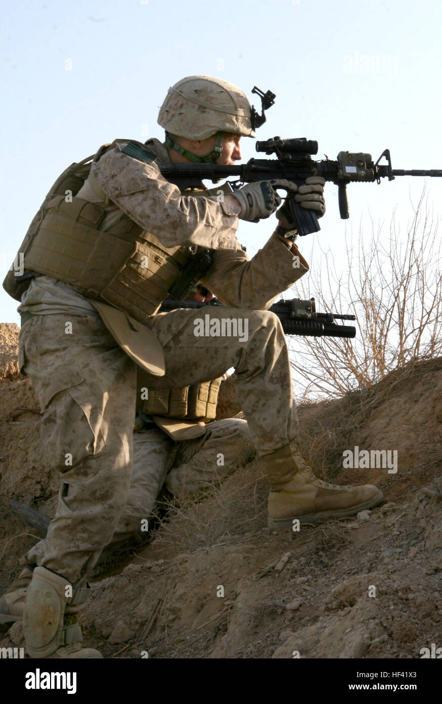 A Marine with Bravo Company, 1st Battalion, 6th Marine Regiment take ...