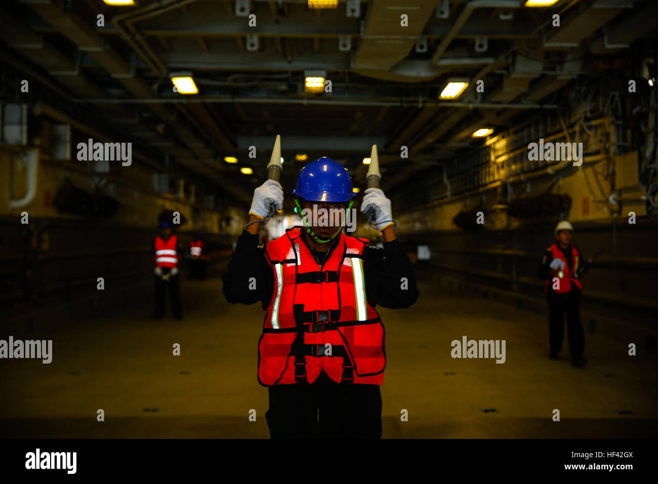 Mexican Navy 2nd Maestre CG Contramaestre Jose Antonio Morales guides U.S. Marine amphibious assault vehicles aboard the Mexican navy tank landing ship ARM Usumacinta (A-412) July 5, 2016. U.S. Marines assigned to Bravo Company, 3rd Amphibious Assault Battalion practiced AAV embarkation procedures with crewmembers of the Usumacinta (A-412) as part of the Rim of Pacific 2016 exercise. Twenty-six nations, more than 40 ships and submarines, more than 200 aircraft and 25,000 personnel are participating in RIMPAC from June 30 to Aug. 4, in and around the Hawaiian Islands and Southern California. Th Stock Photo