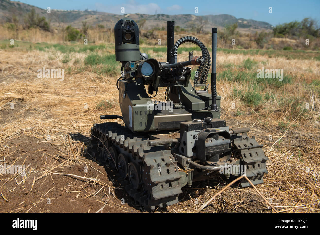 Marines with 3rd Battalion, 5th Marine Regiment tested the newly developed Modular Advanced Armed Robotic System in a simulated combat environment at Marine Corps Base Camp Pendleton, Calif., July 8, 2016. The system was built by the Marine Corps Warfighting Laboratory to assist Marines in carrying gear and clearing buildings.  The Marine Corps Warfighting Laboratory is conducting a Marine Air-Ground Task Force Integrated Experiment to explore new gear and assess its capabilities for potential future use. The Warfighting Lab identifies possible challenges of the future, develops new warfightin Stock Photo