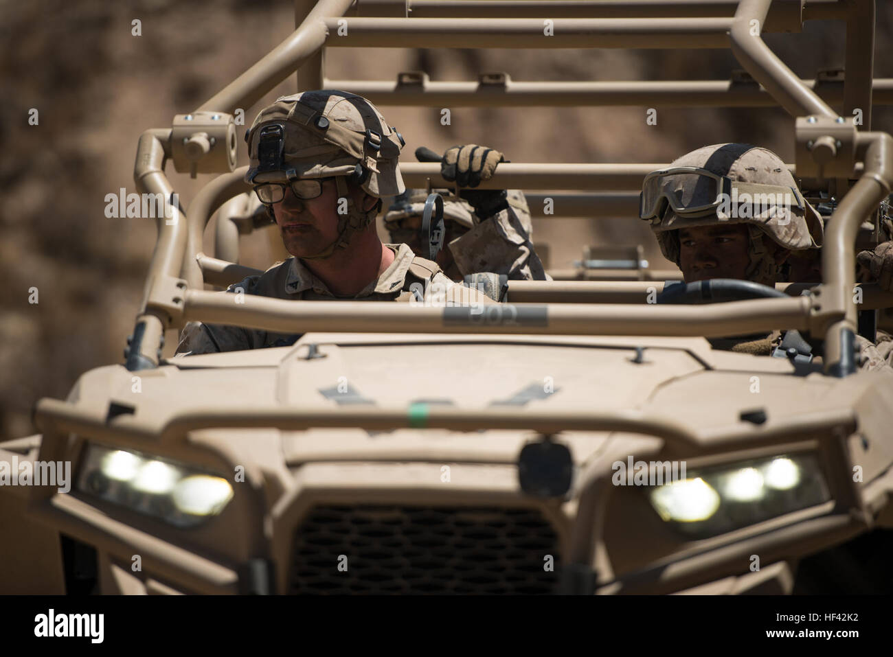 Marines with 3rd Battalion, 5th Marine Regiment are on the move in an Internally Transportable Vehicle – Replacement to quickly resupply one of the platoons at Marine Corps Base Camp Pendleton, Calif., July 13, 2016. The system was built by the Marine Corps Warfighting Laboratory, which is conducting a Marine Air-Ground Task Force Integrated Experiment in conjunction with Rim of the Pacific exercise to explore new gear and assess its capabilities for potential future use. The Warfighting Lab identifies possible challenges of the future, develops new warfighting concepts, and tests new ideas to Stock Photo