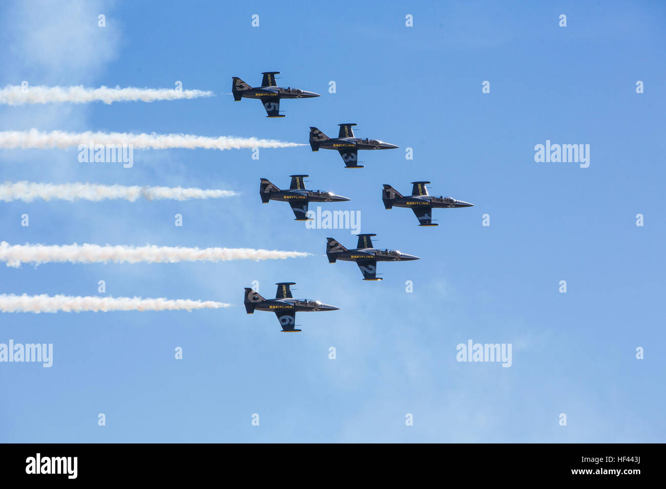The Breitling Jet Team fly in precision formation during the 2016 Marine Corps Air Station (MCAS) Miramar Air Show at MCAS Miramar, Calif., Sept. 24, 2016. The MCAS Miramar Air Show honors 100 years of the Marine Corps Reserves by showcasing aerial prowess of the Armed Forces and their appreciation of the civilian community’s support to the troops. (U.S. Marine Corps photo By Corporal Jessica Y. Lucio/Released) MCAS Miramar Air Show 160924-M-UX416-009 Stock Photo