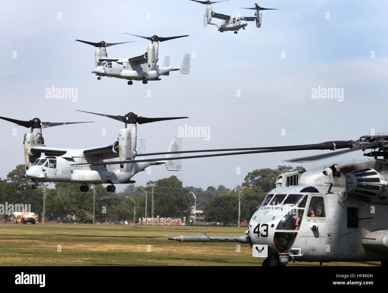 CH53E Super Stallion helicopters and MV22B Ospreys land aboard Marine
