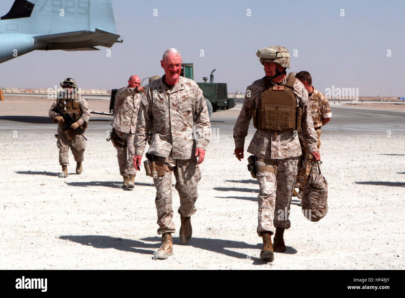 Regional Command Southwest commander, Maj. Gen. Richard P. Mills greets ...