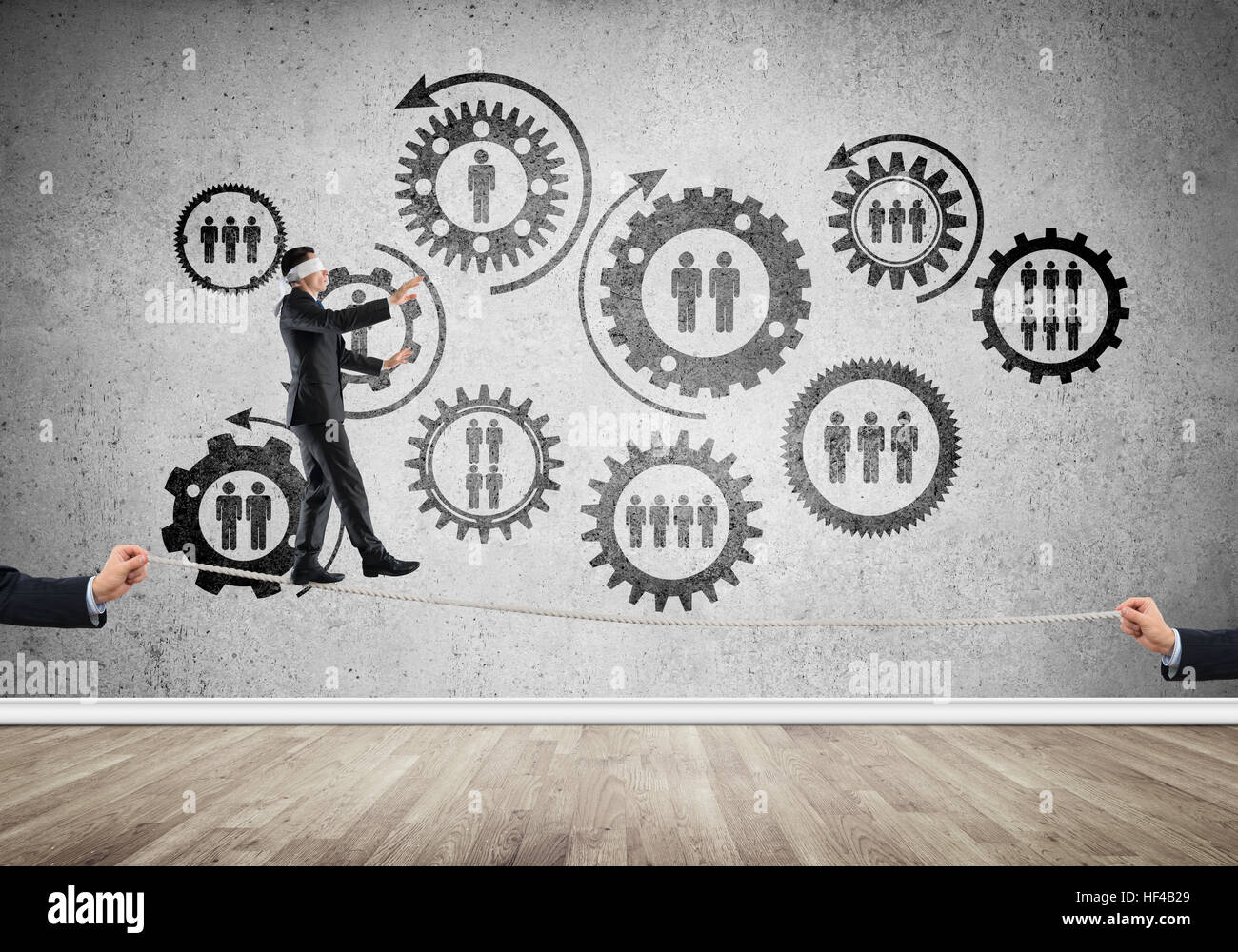 Business concept of risk support and assistance with man balancing on ...