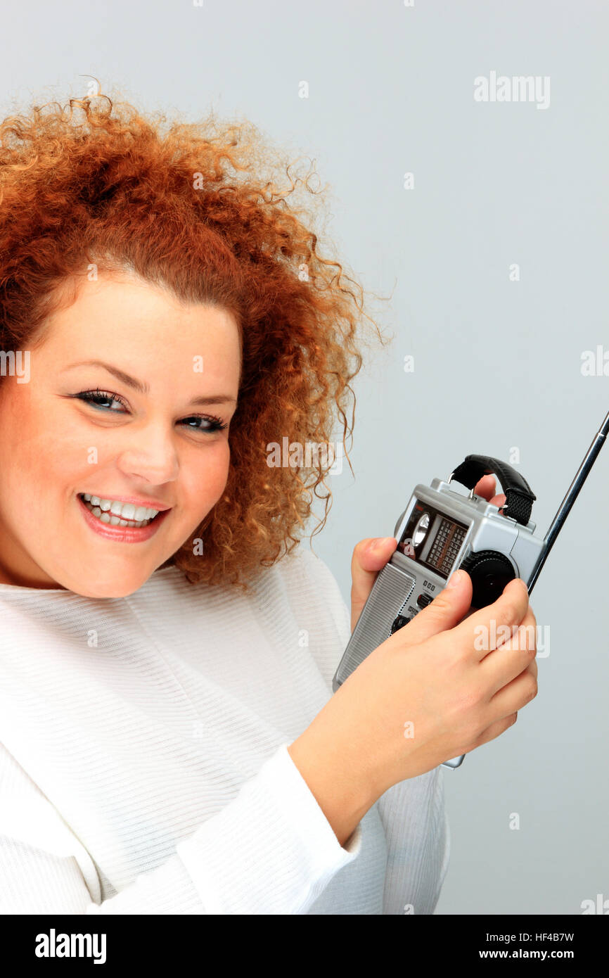 pretty girl with portable radio listening music Stock Photo Alamy