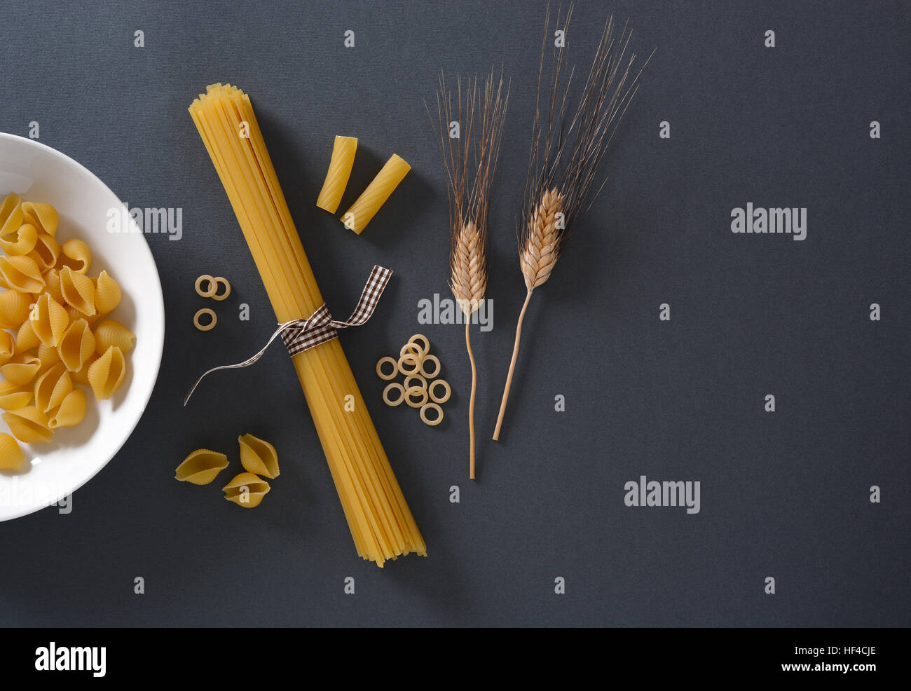 Italian pasta with ears of wheat near Stock Photo Alamy