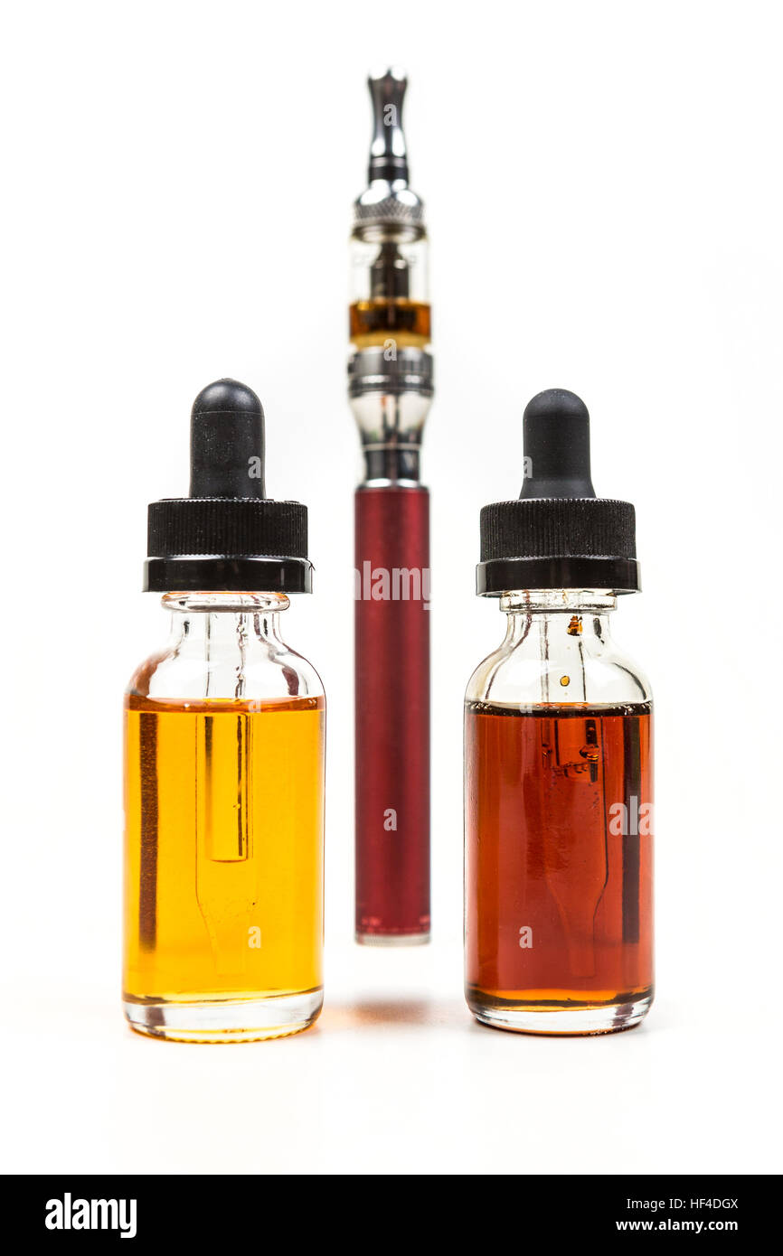 Assorted flavors of vape juice and an ecigarette isolated on white ...