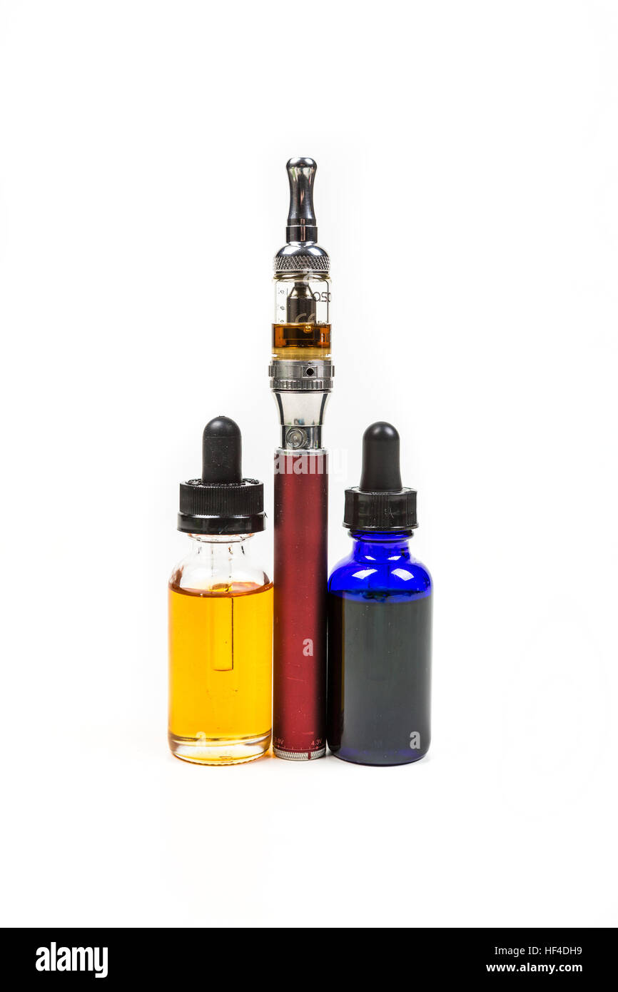 Assorted flavors of vape juice and an ecigarette isolated on white ...