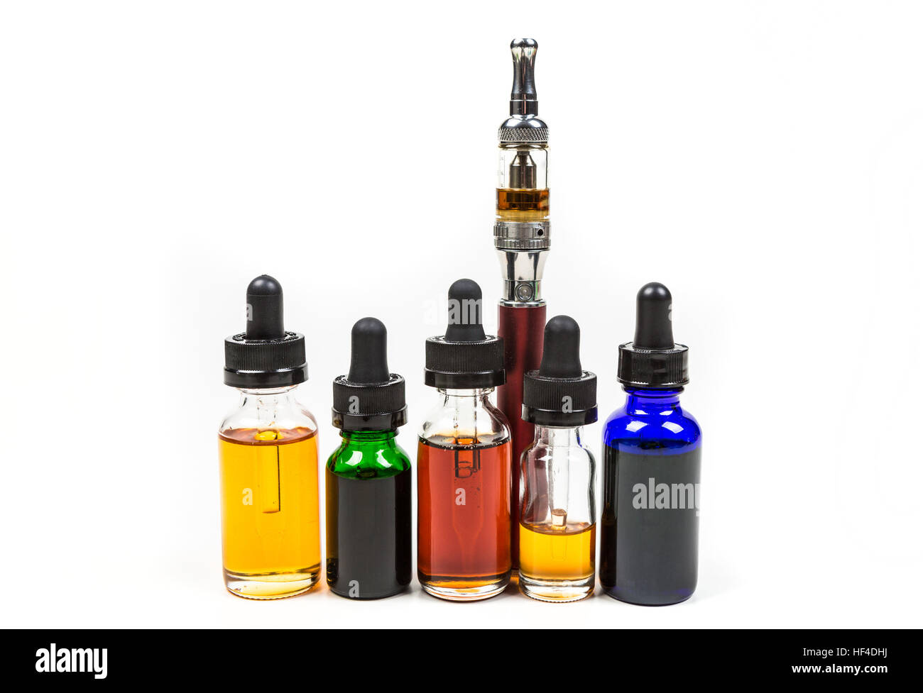 Assorted flavors of vape juice and an ecigarette isolated on white ...