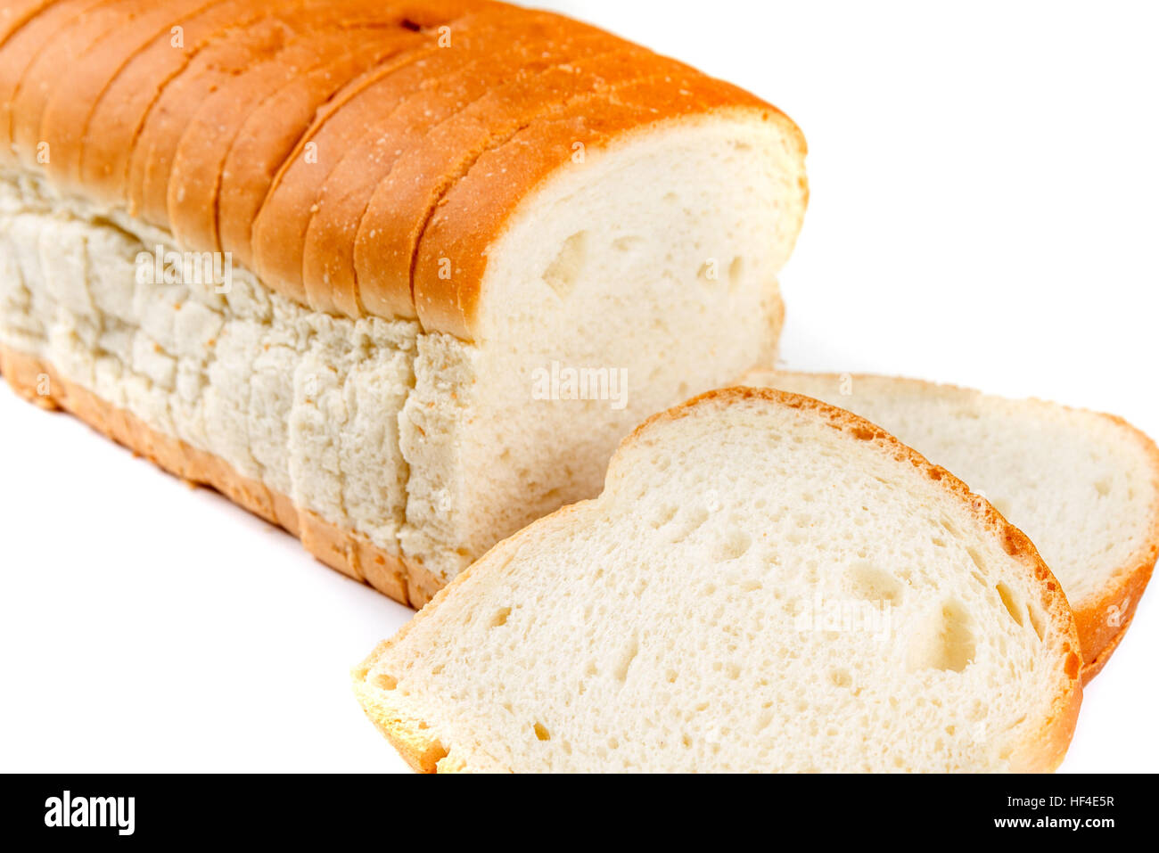 Loaf of whole grain bread isolated on white background Stock Photo - Alamy