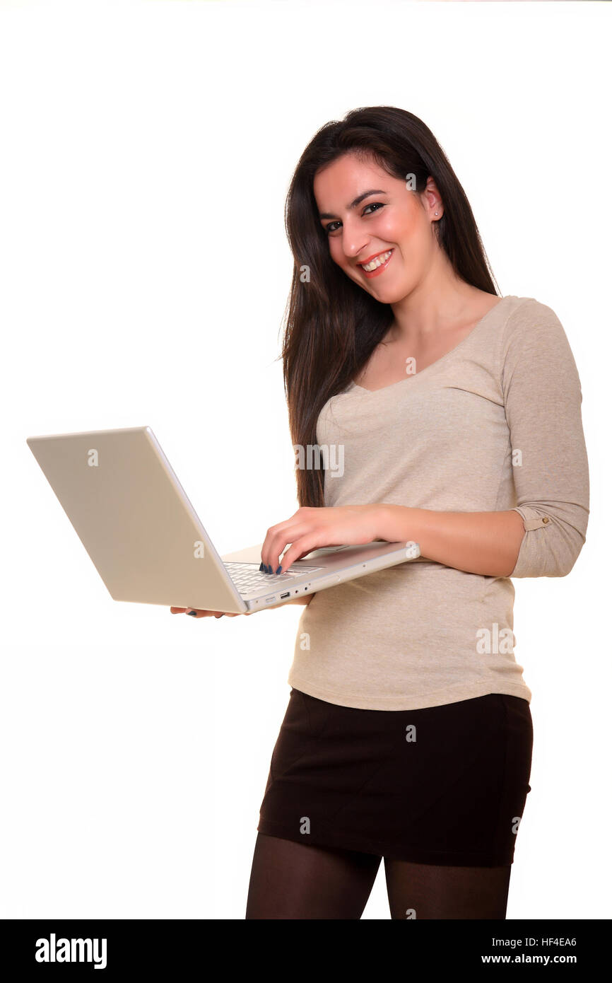 pretty young girl holding a notebook isolated on a white background ...