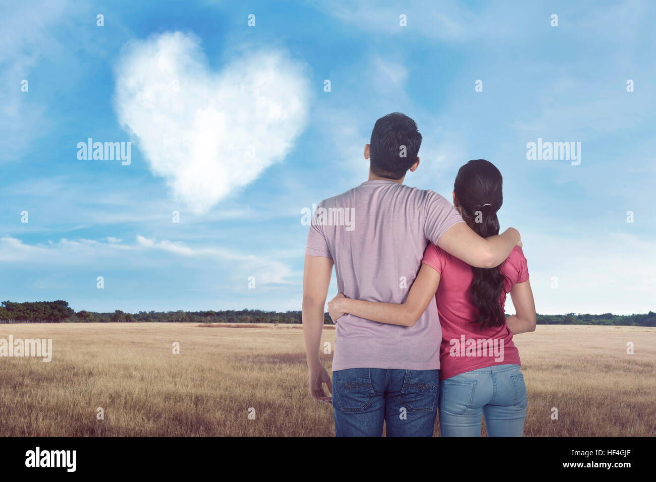 Young asian couple looking cloud with heart shape in the sky Stock ...