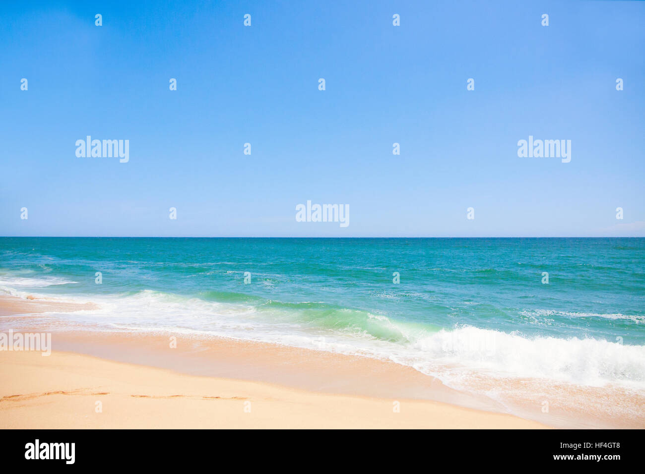 The coast of blue ocean and sand beach with blue sky Stock Photo - Alamy