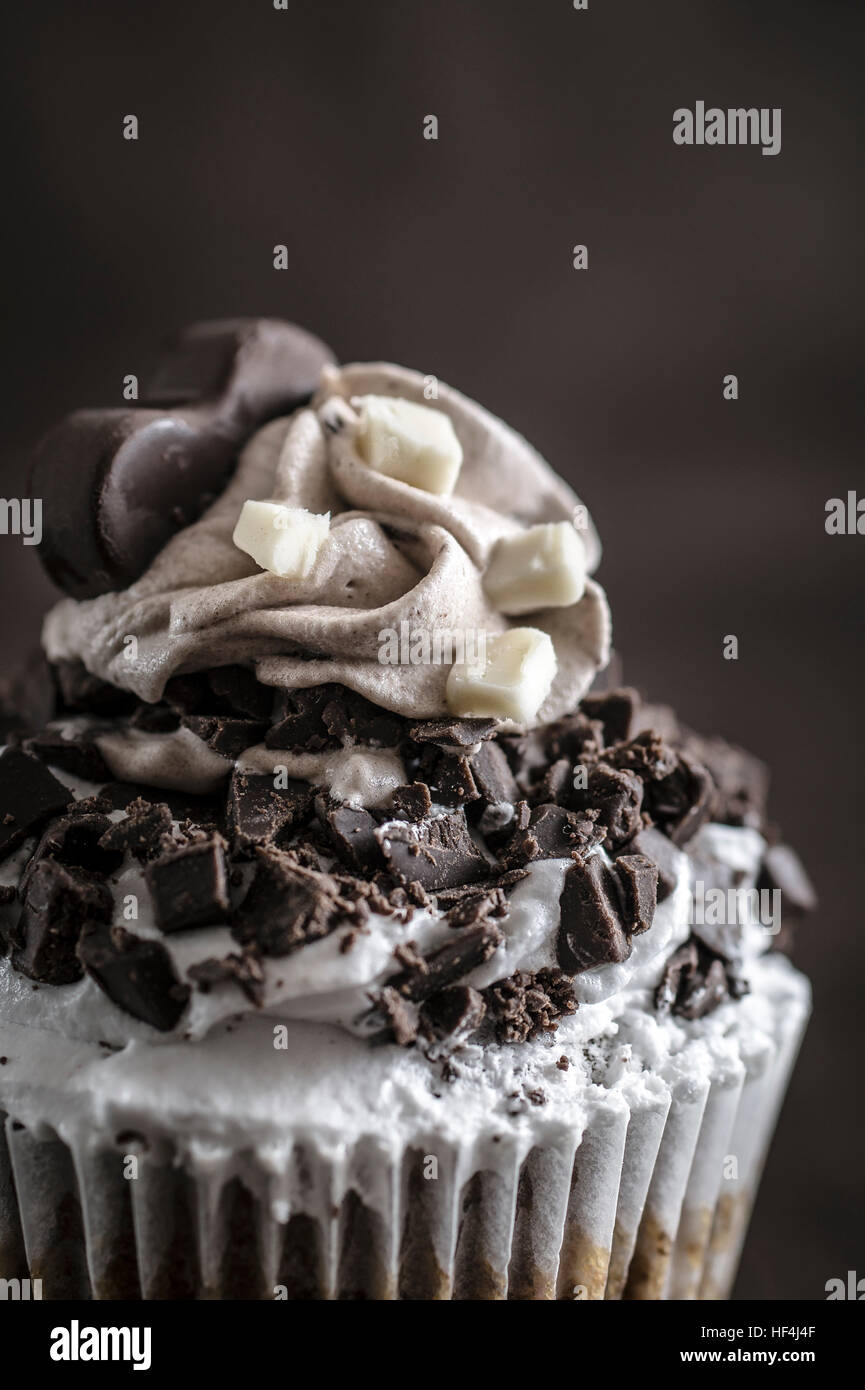 Closeup of chocolate cupcake over wooden background Stock Photo